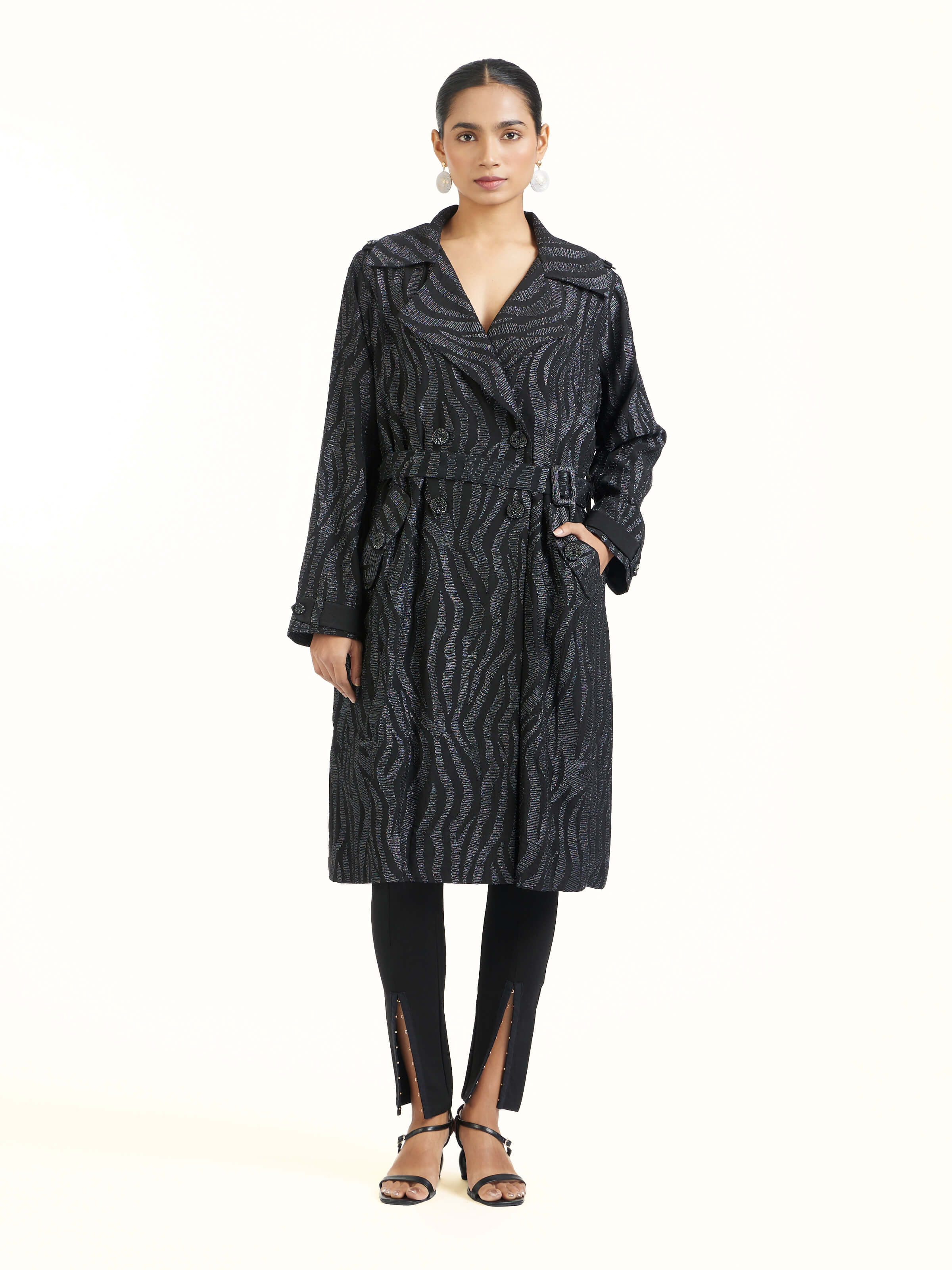 Front view of black aari hand embroidered trenchcoat showcasing intricate embroidery and structured silhouette