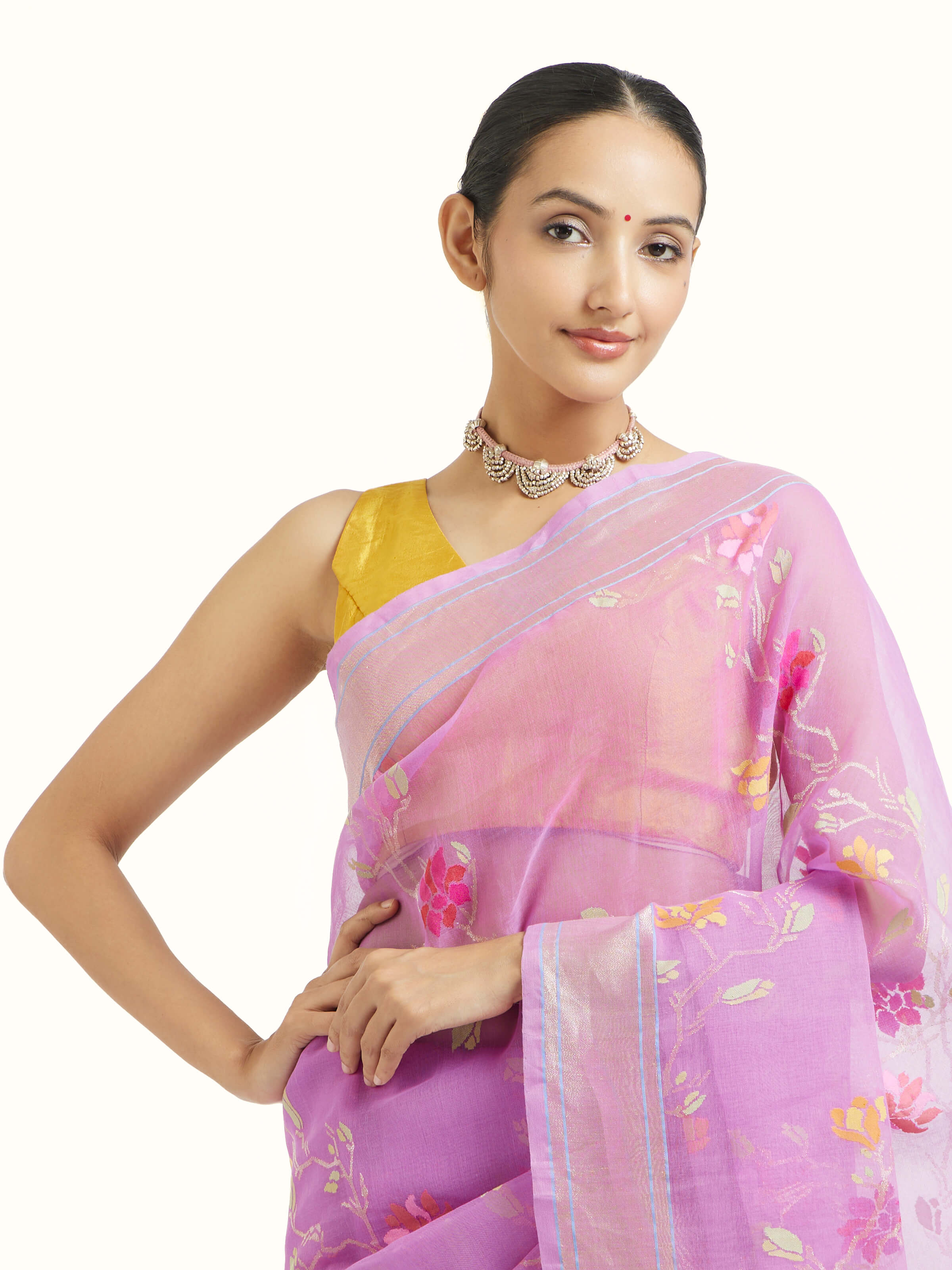 Angled view of lavender cotton Awadh Jamdani Banarasi saree highlighting Jamdani weave and texture