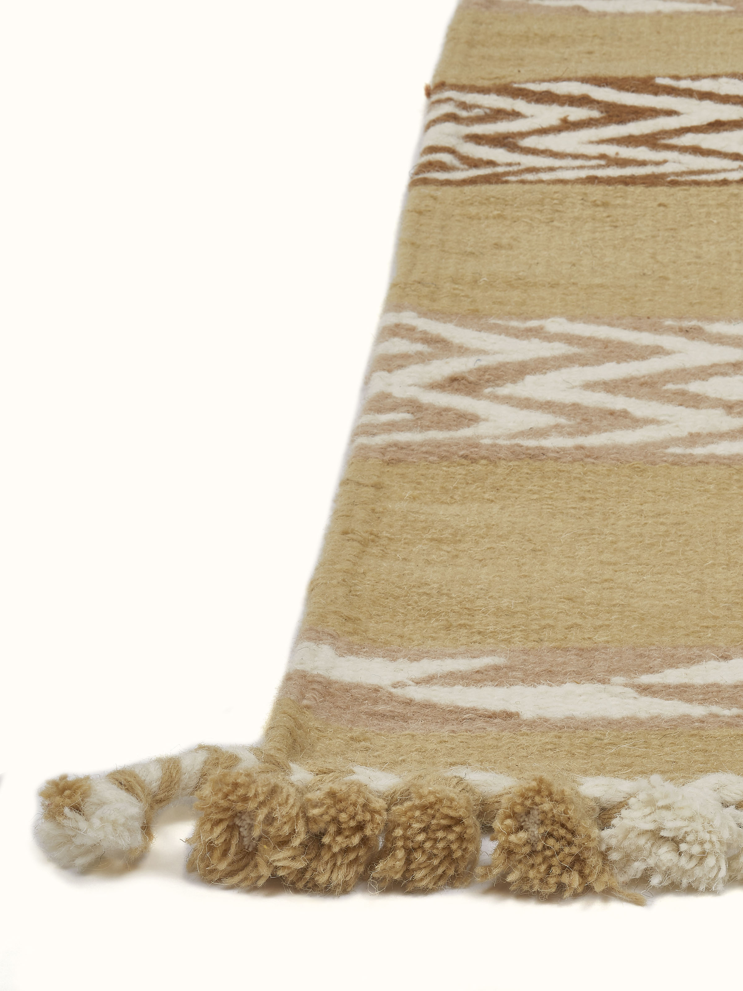 Side angle focusing on the wool texture and craftsmanship of the handwoven fabric