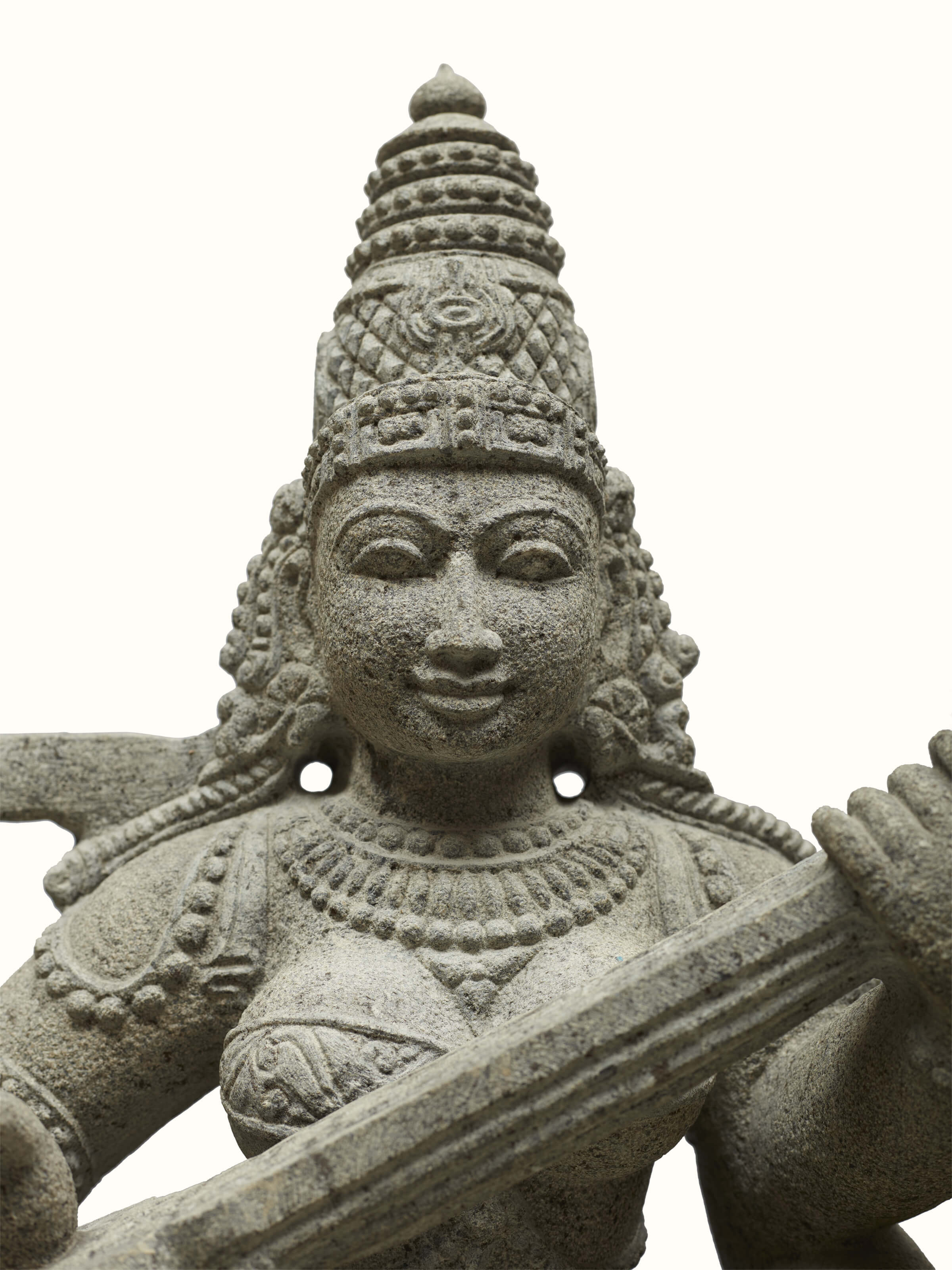 Detailed view of the back of the carved stone goddess Saraswati idol, showing craftsmanship and finishing touches.