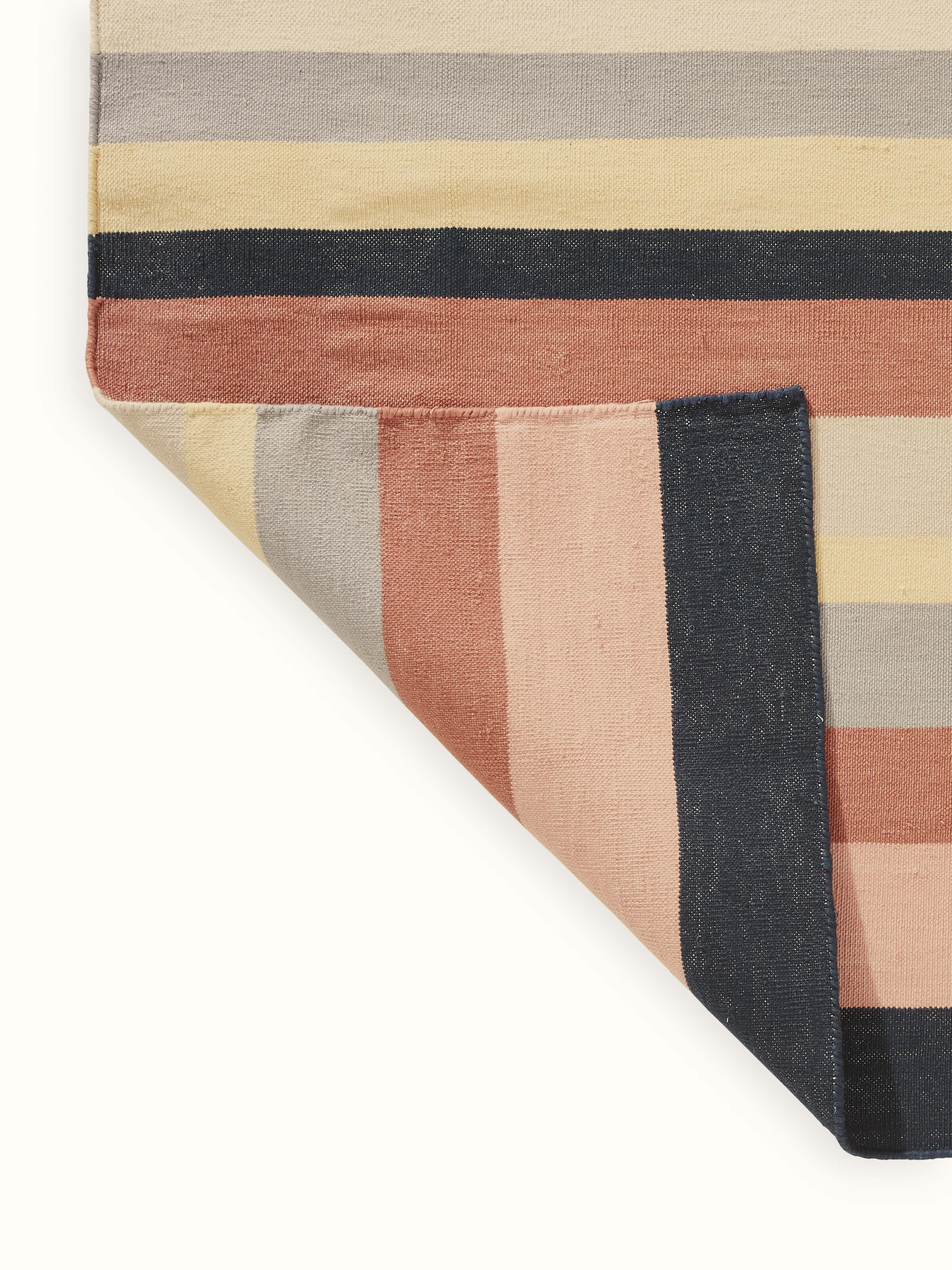 Back view showcasing neat weaving and fine finishing of the dhurrie.