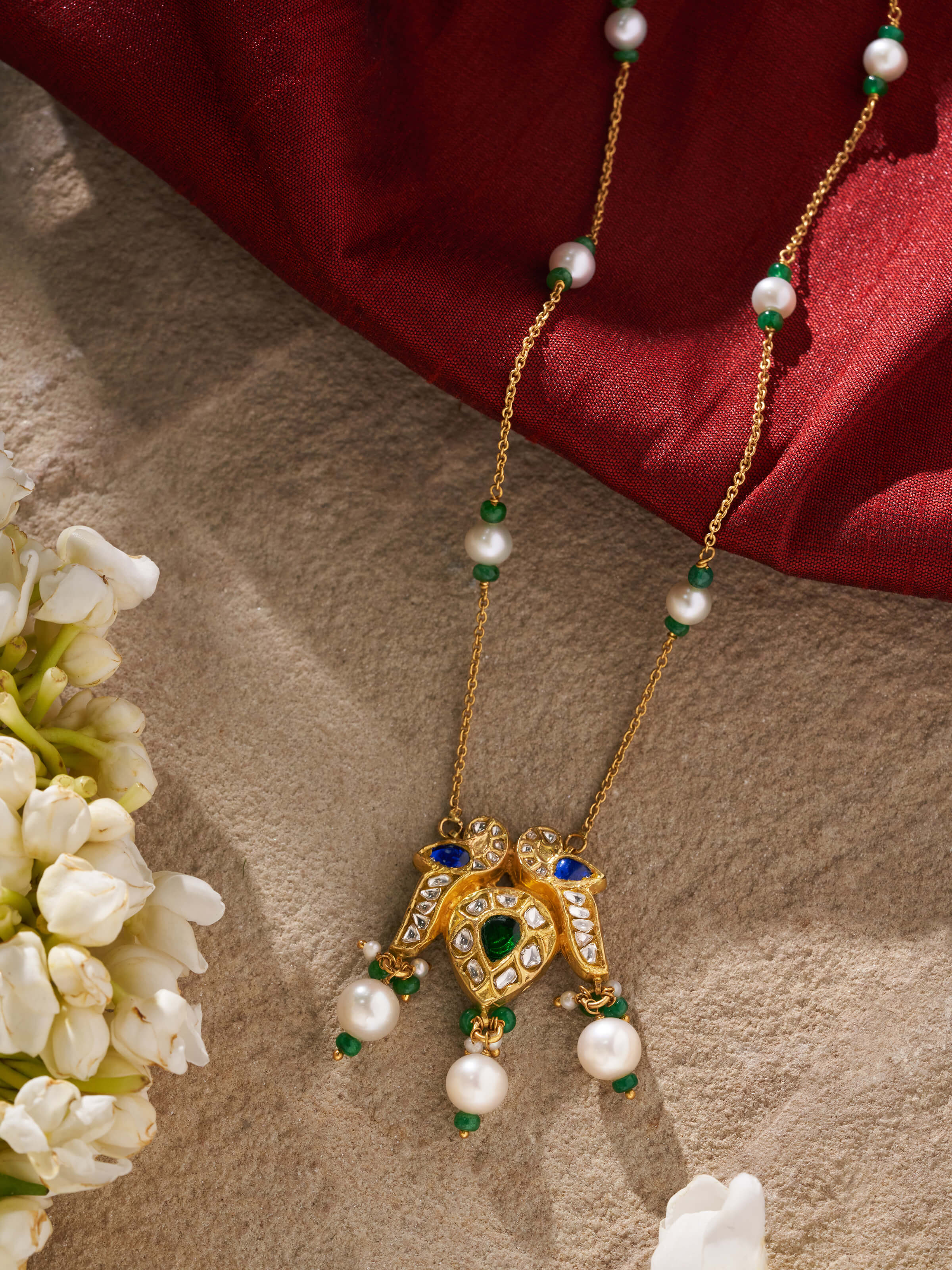 Alternate side view of Swadesh 22 Karat Gold Pendant & Chain emphasizing polished surface and elegant contours
