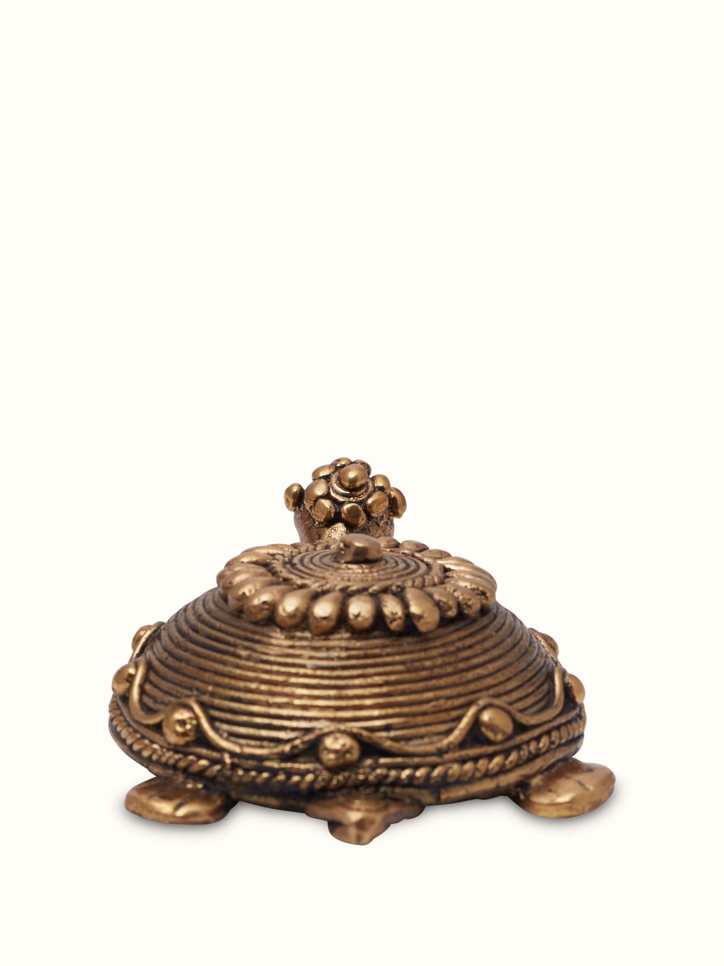 Bottom view of dhokra tortoise brass figurine showing base detail