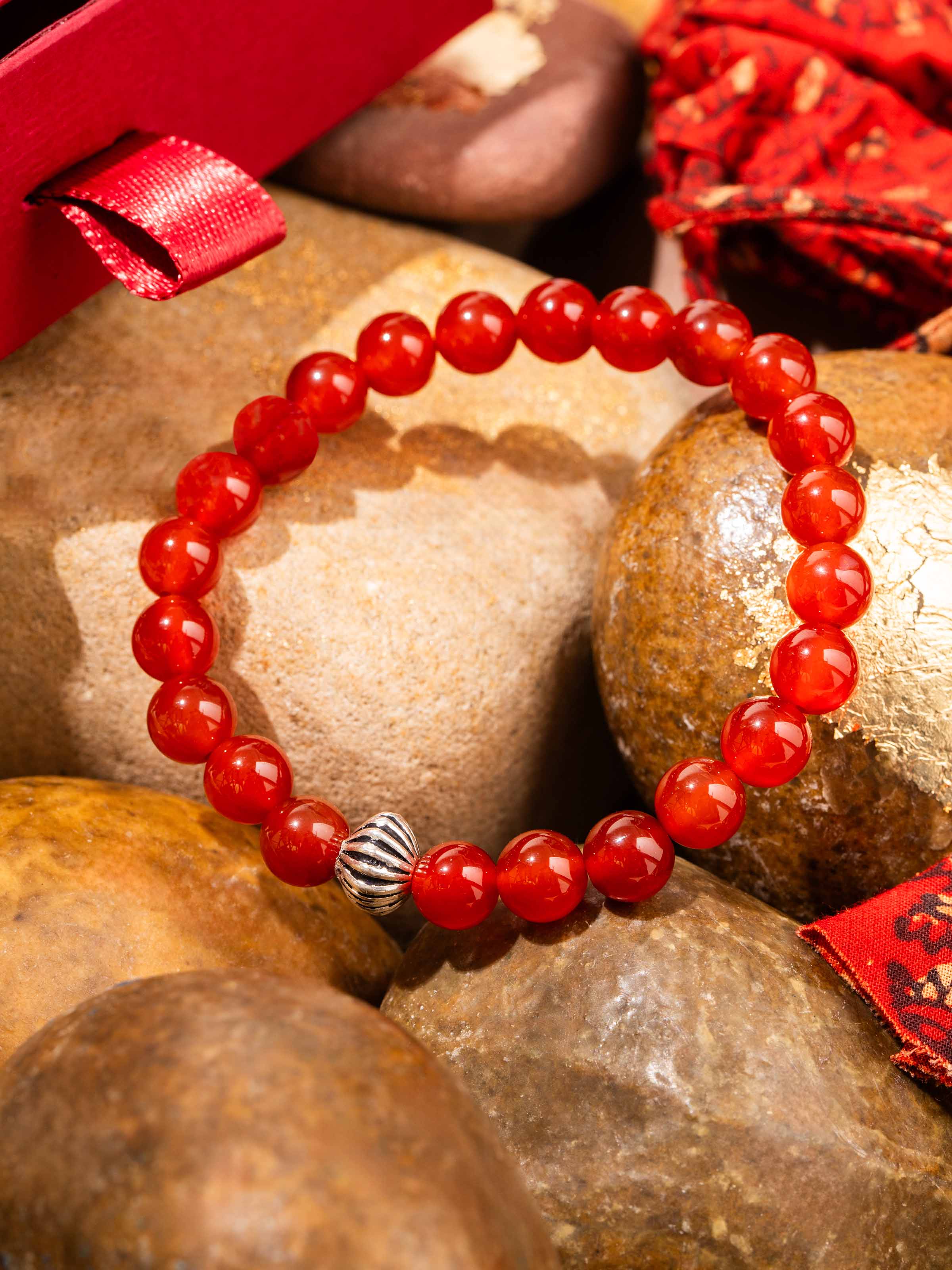 Detailed image of Carnelian Silver Bracelet displaying the handcrafted silver links and vibrant gemstone finish