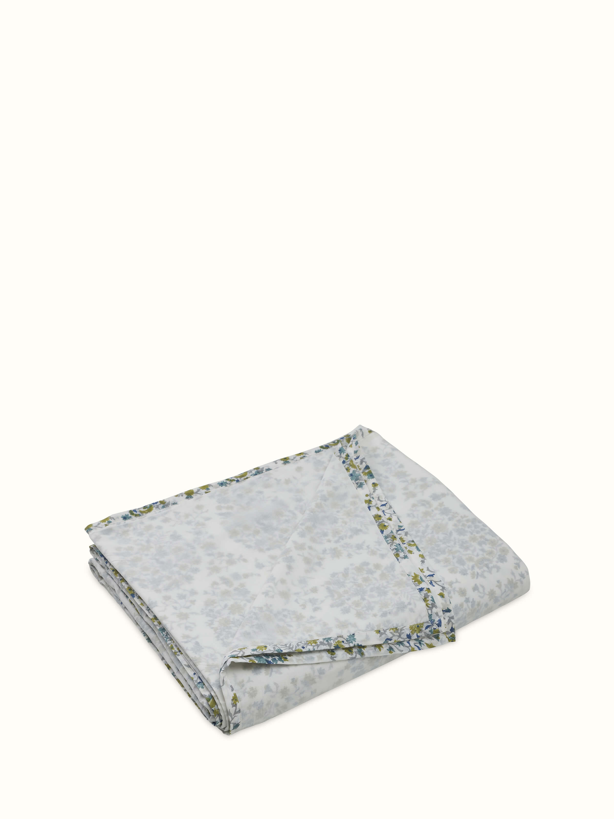 Angled view displaying detailed hand block motifs and neat edges.