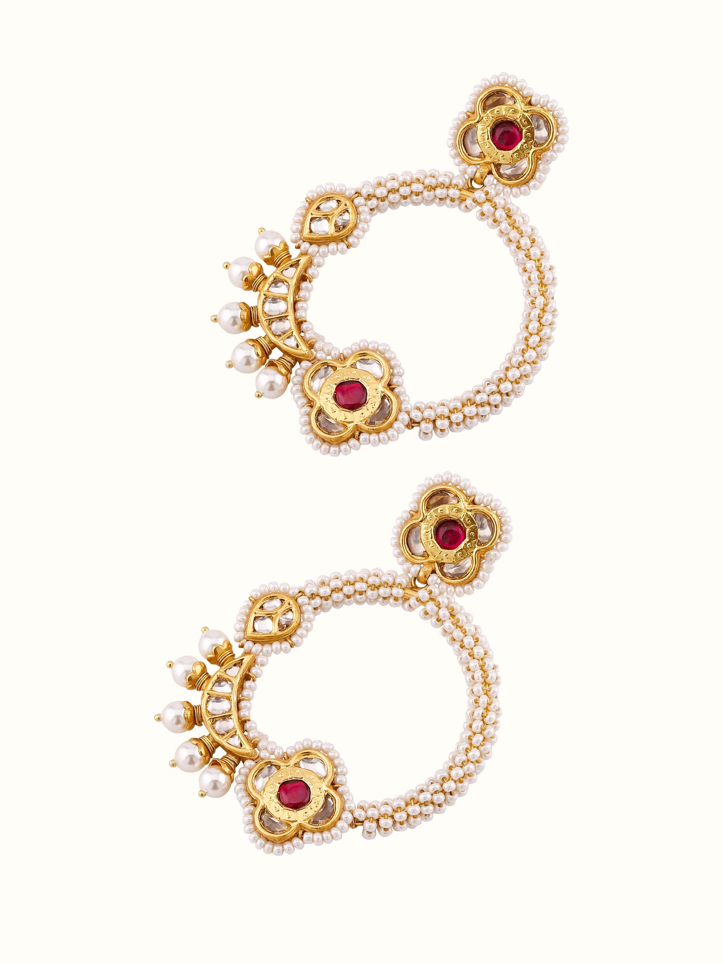 Overhead view of Silver Smithing chandbalis displaying the circular form and handcrafted embellishments.