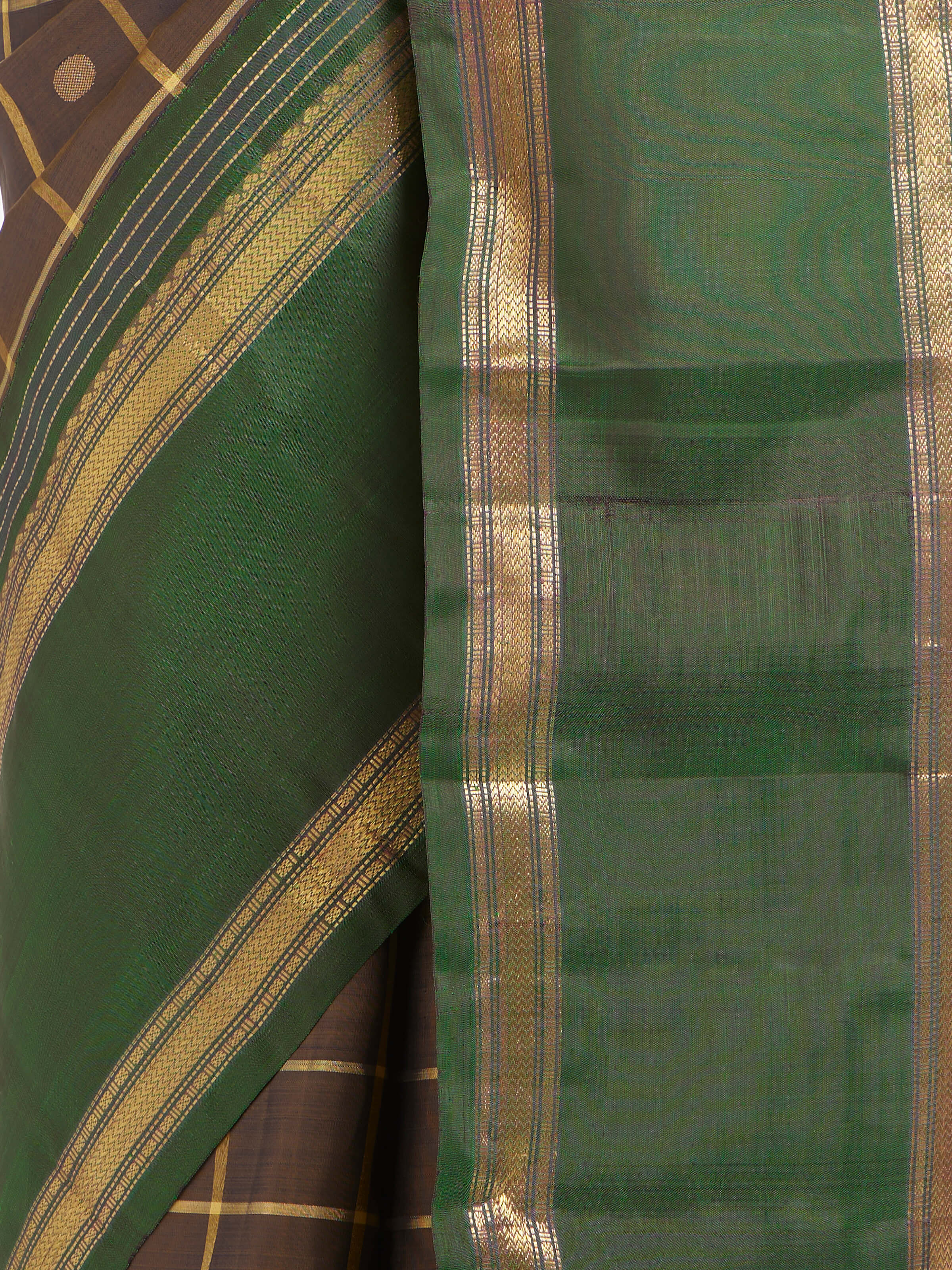 Detail view of black silk Kancheepuram saree highlighting silk texture and zari work