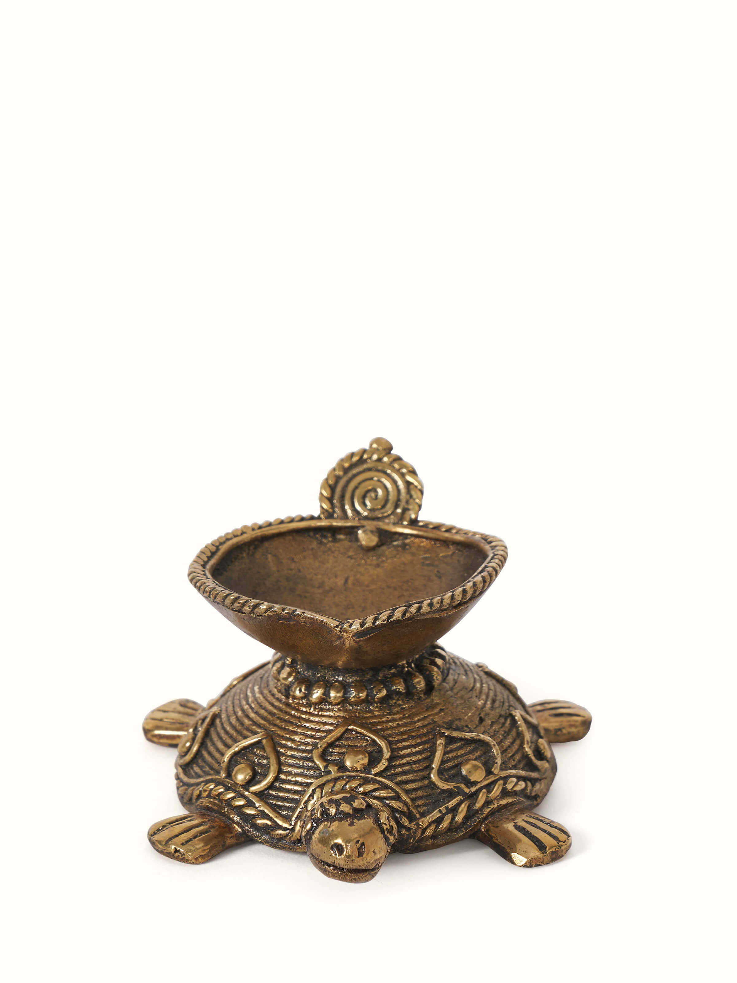 Front view of Dhokra Brass Diya showcasing traditional Dhokra craftsmanship and intricate design.