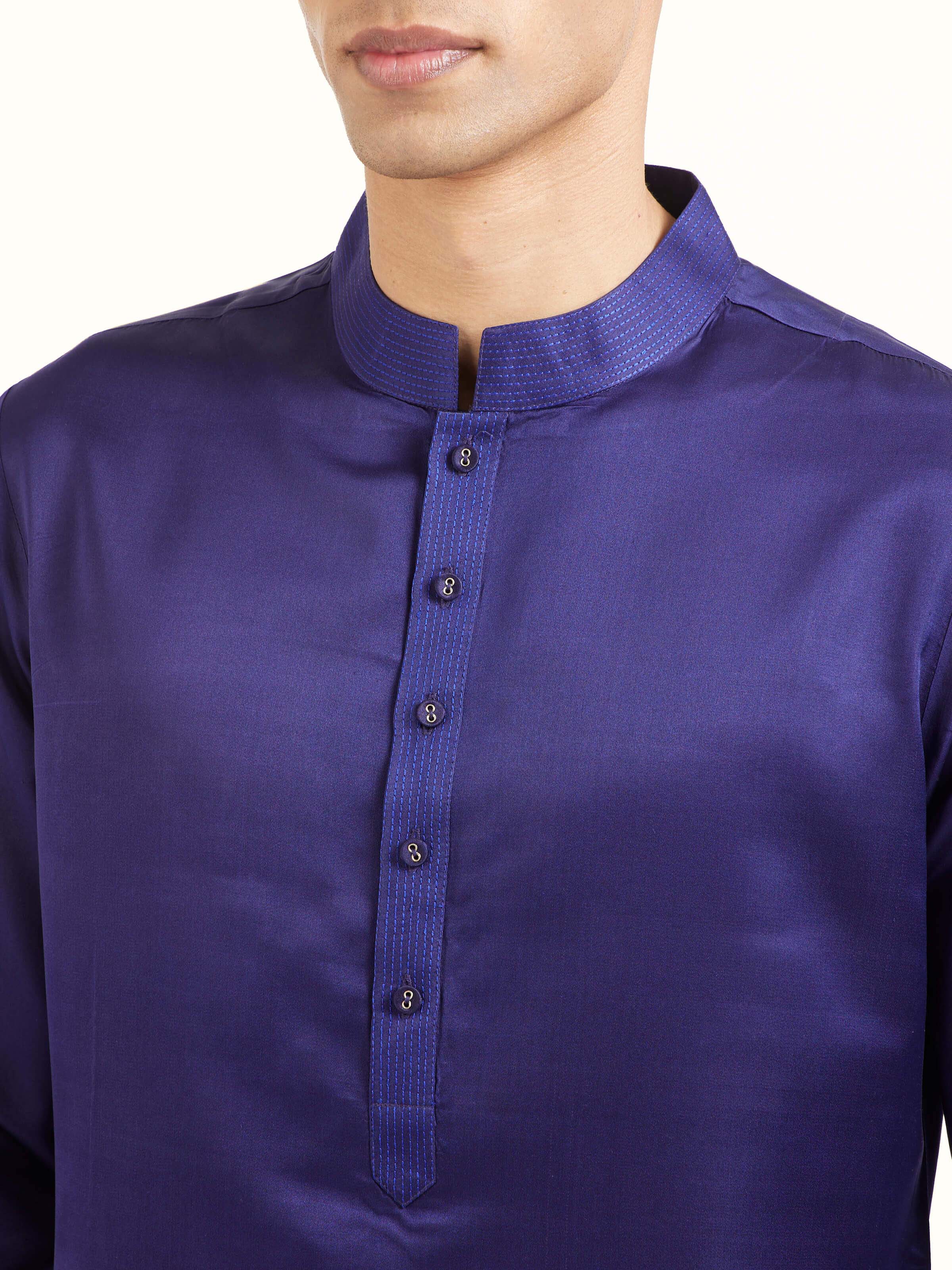 Detail view of navy blue katan silk Banarasi midi kurta pant set showing fabric texture and weave