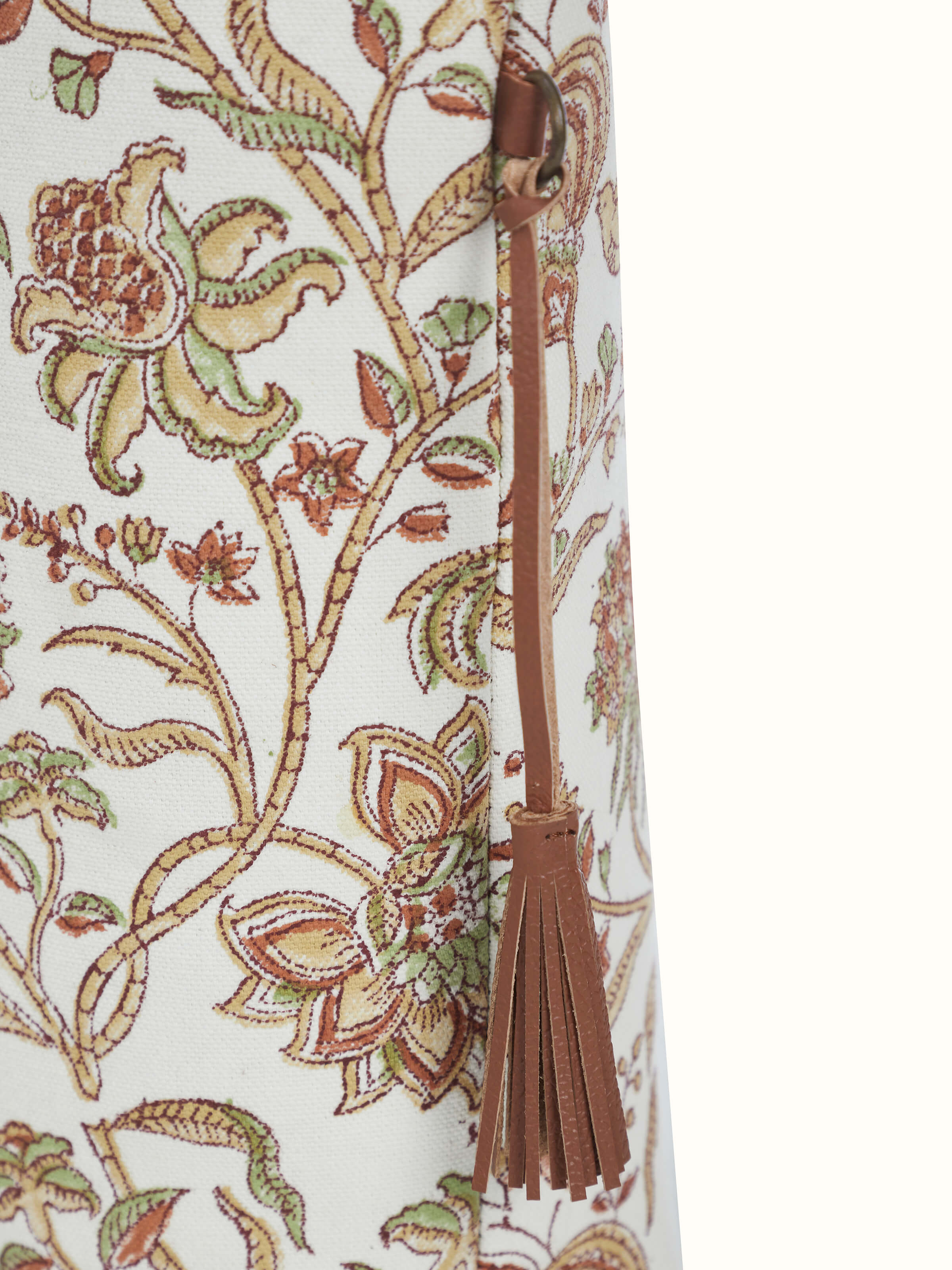 Overhead shot of mustard leather and textile hand block printed tote bag showing spacious interior.