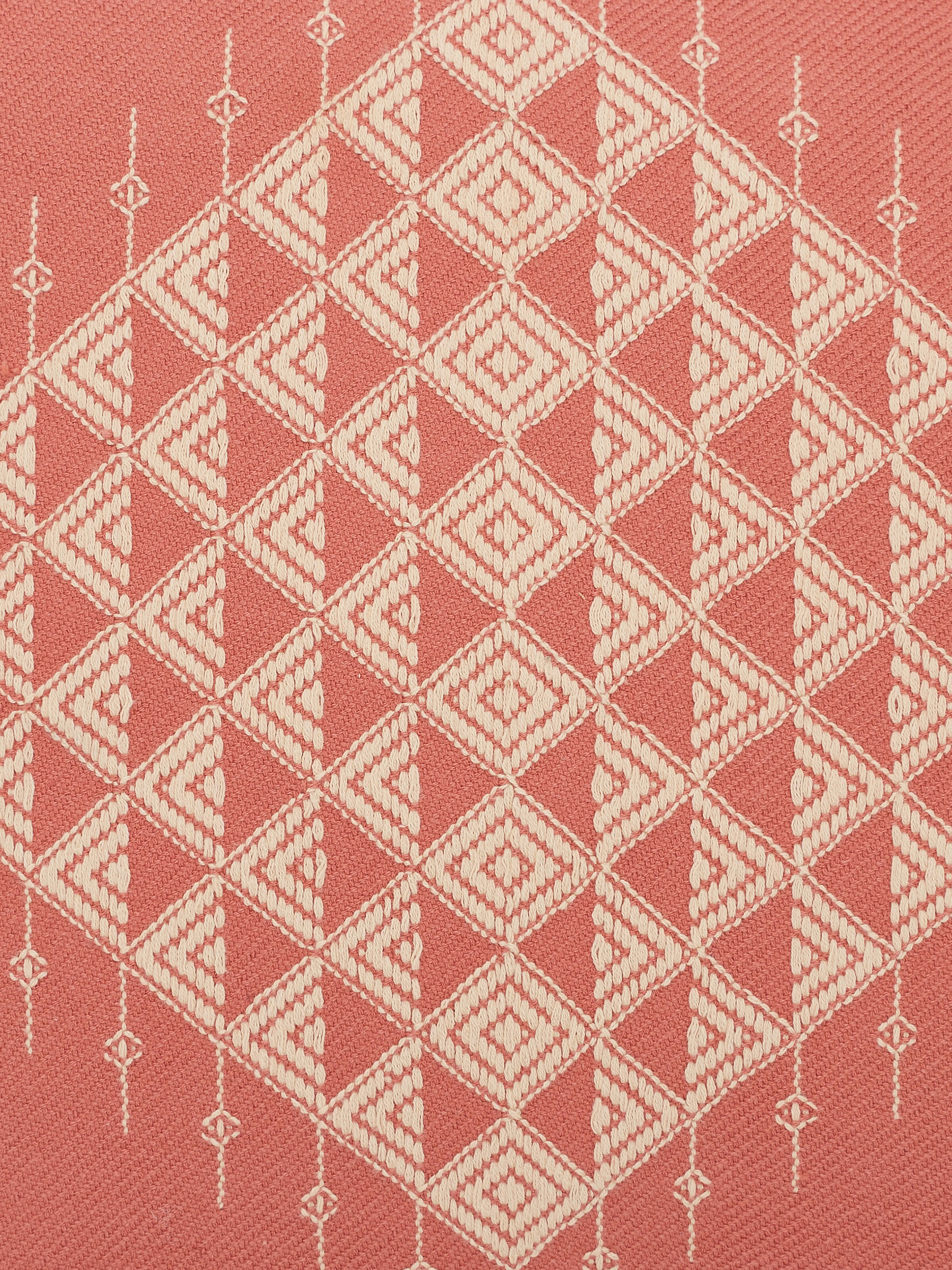 Detailed close-up of Godna Peach Twill Cotton Handwoven Pattu Cushion Cover focusing on the handwoven details and fabric quality