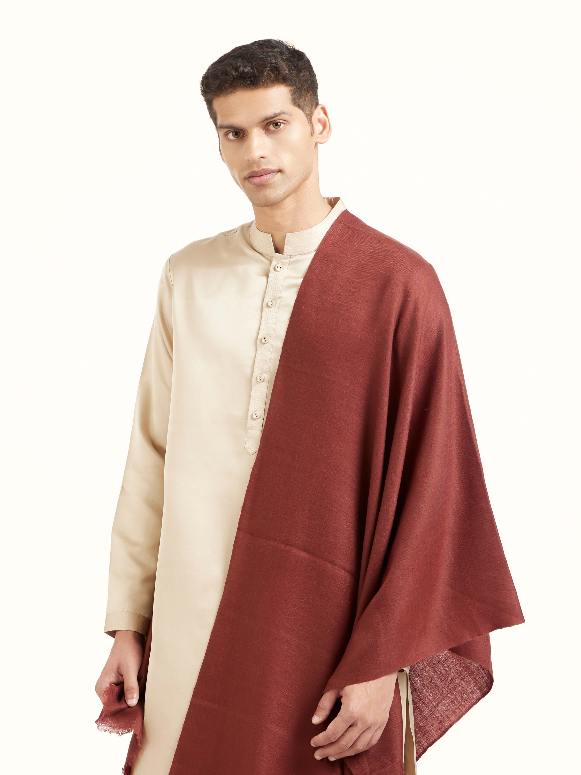 Angled view of brown cashmere stole highlighting fine weave