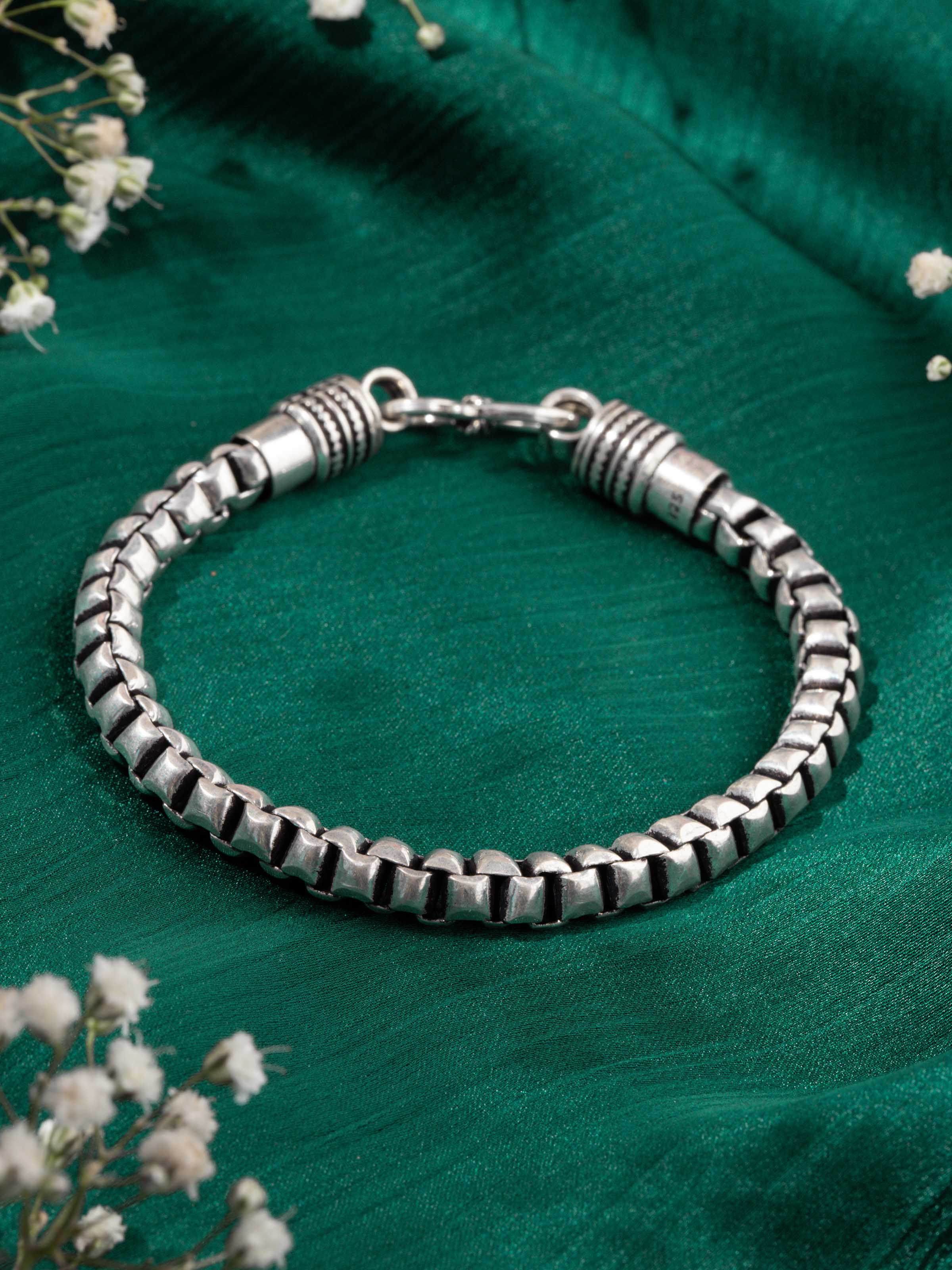 Second lifestyle view of silver bracelet styled with casual outfit
