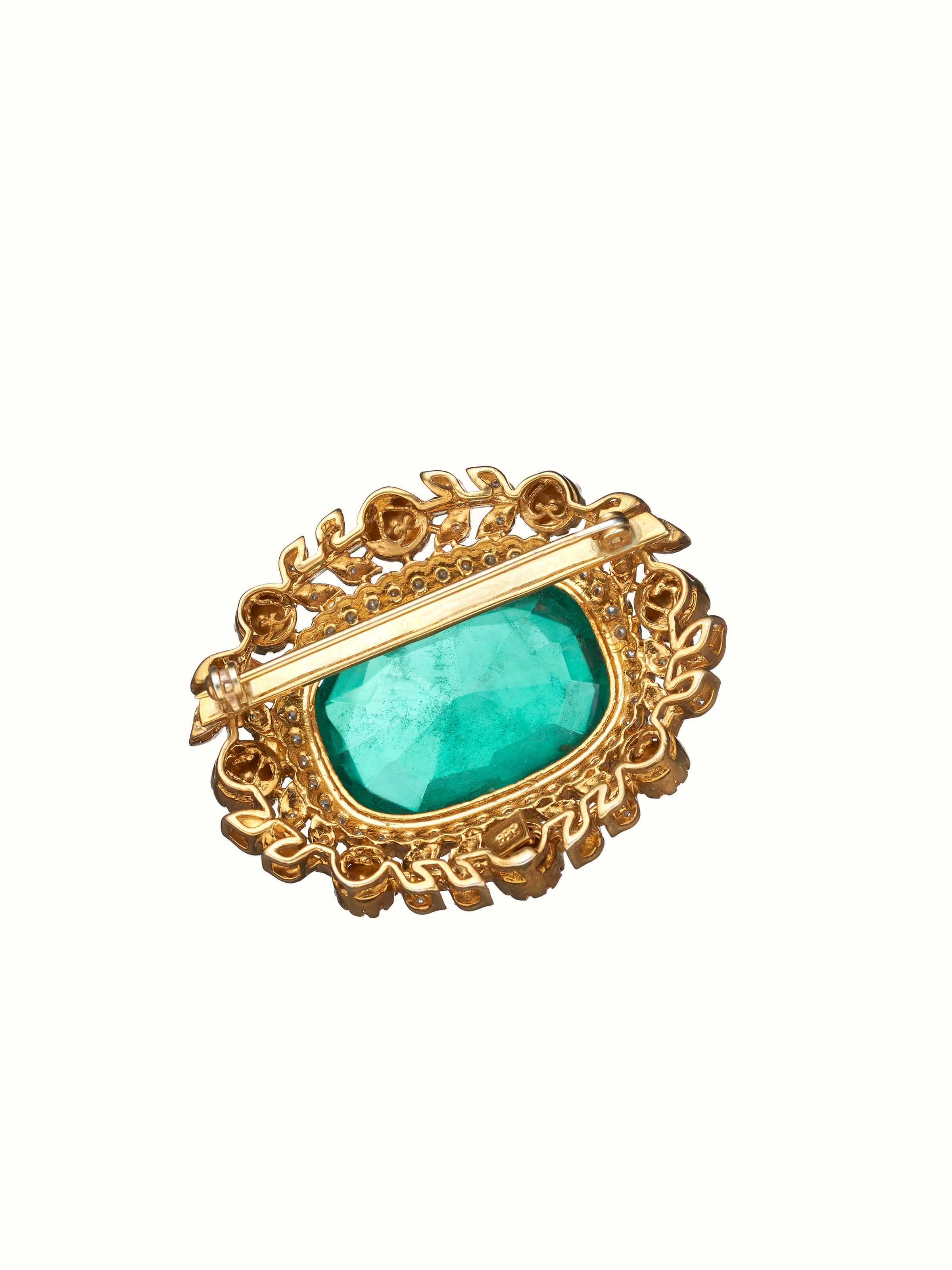back view of silver smithing yellow gold brooch pin with pin clasp
