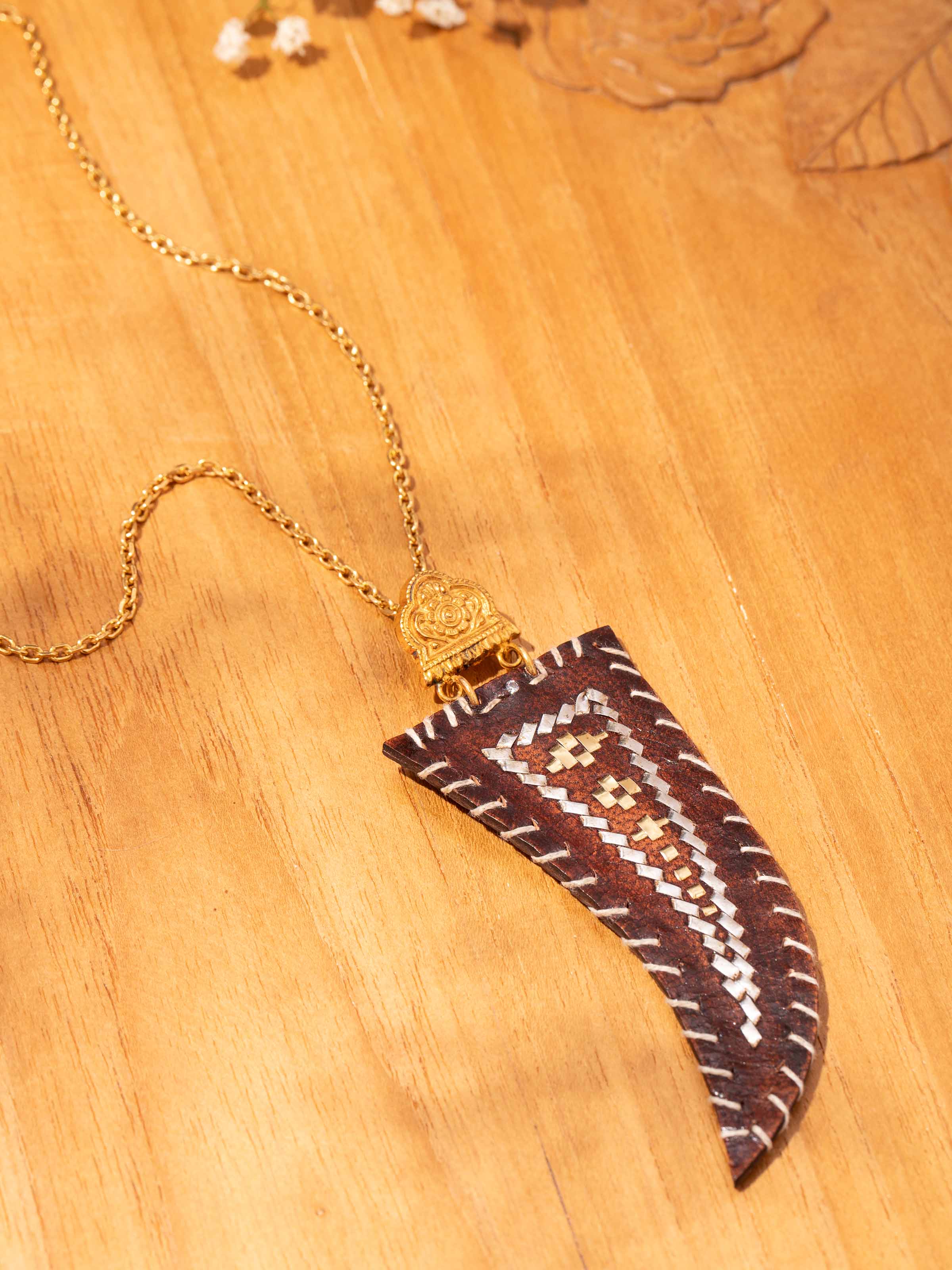 Second lifestyle view highlighting pendant’s bold handcrafted appeal on model