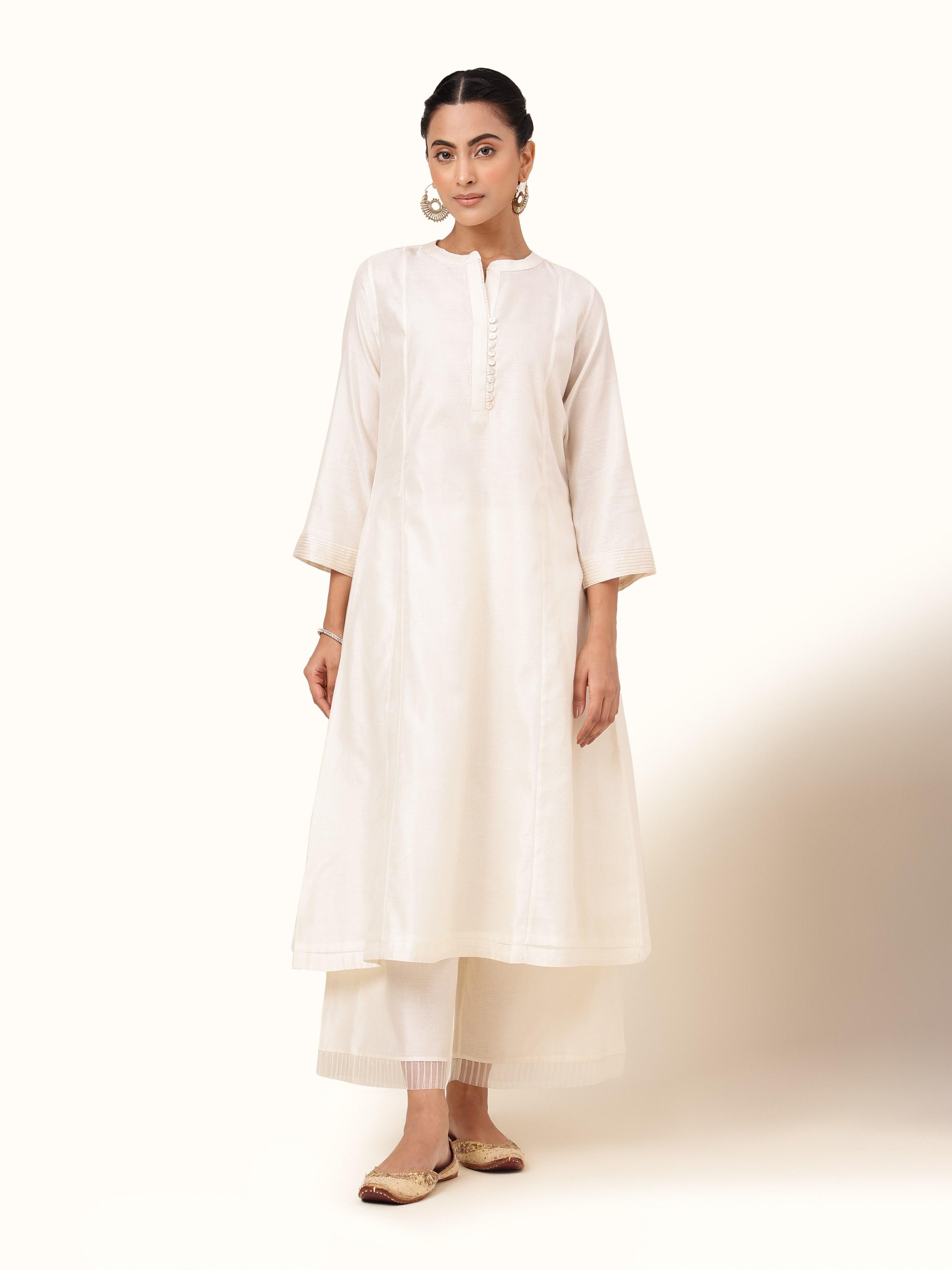 Front view of off-white cotton silk Chanderi kurta with a straight silhouette and woven texture.