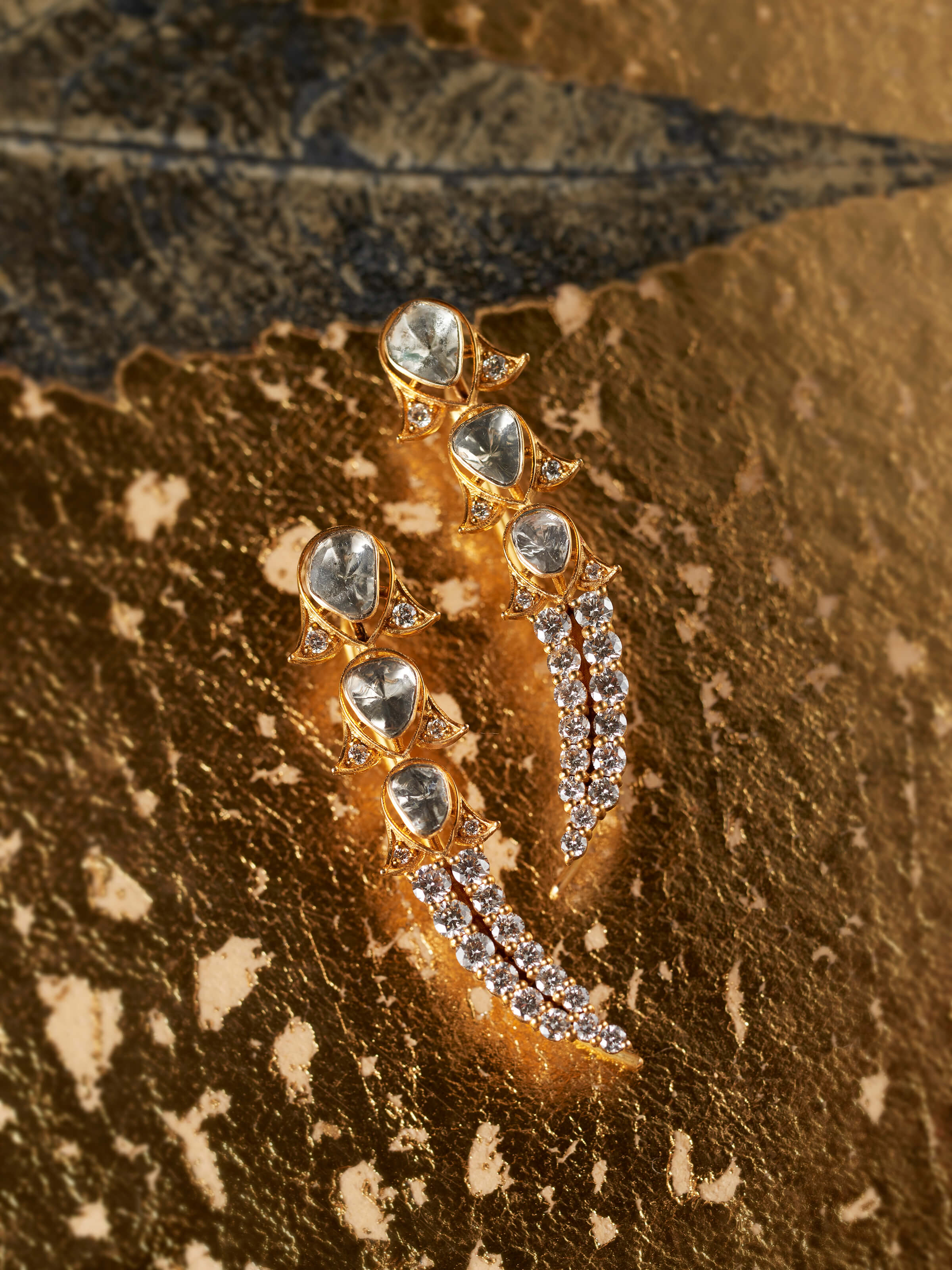 detail view of dank polki 14 karat gold drop earrings design