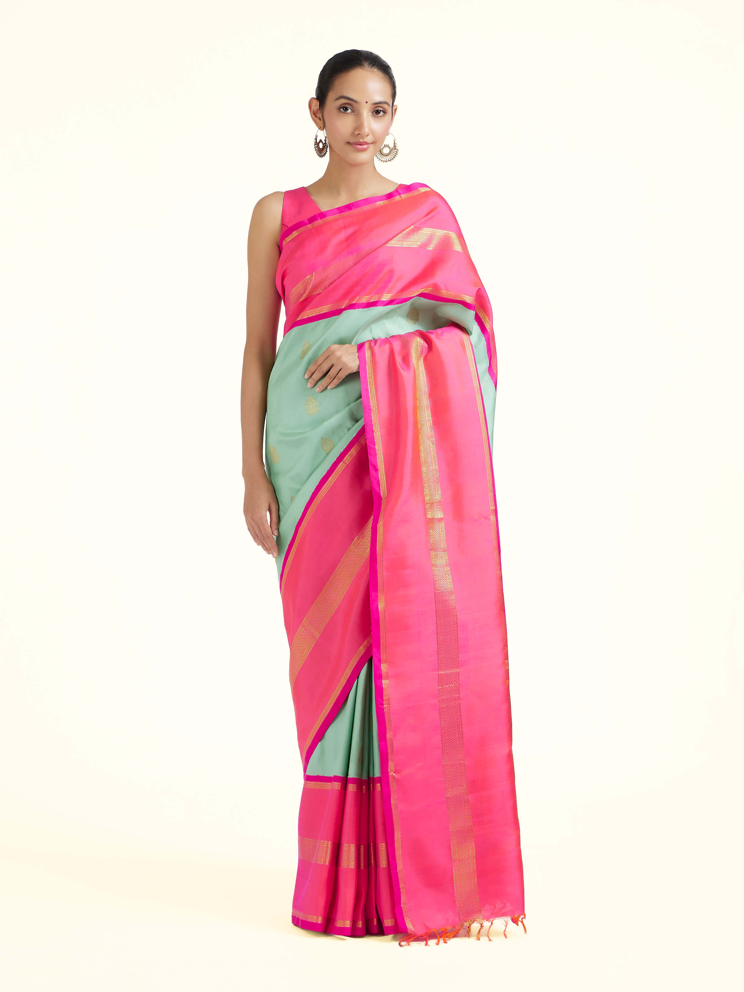 Front view of light blue silk Kancheepuram saree with rich zari woven motifs
