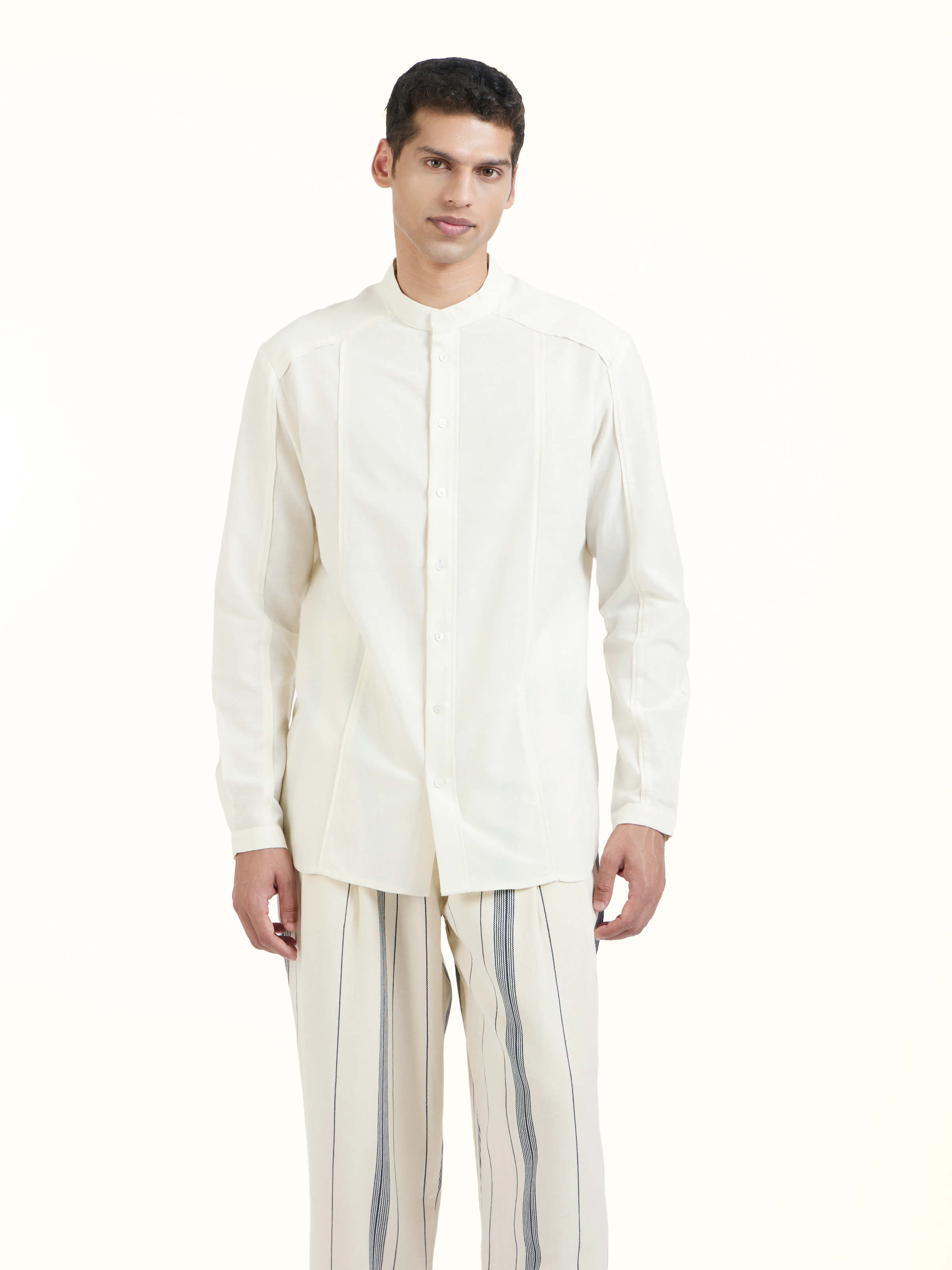 Angled view of ivory cotton handloom full sleeve shirt emphasizing natural fabric weave