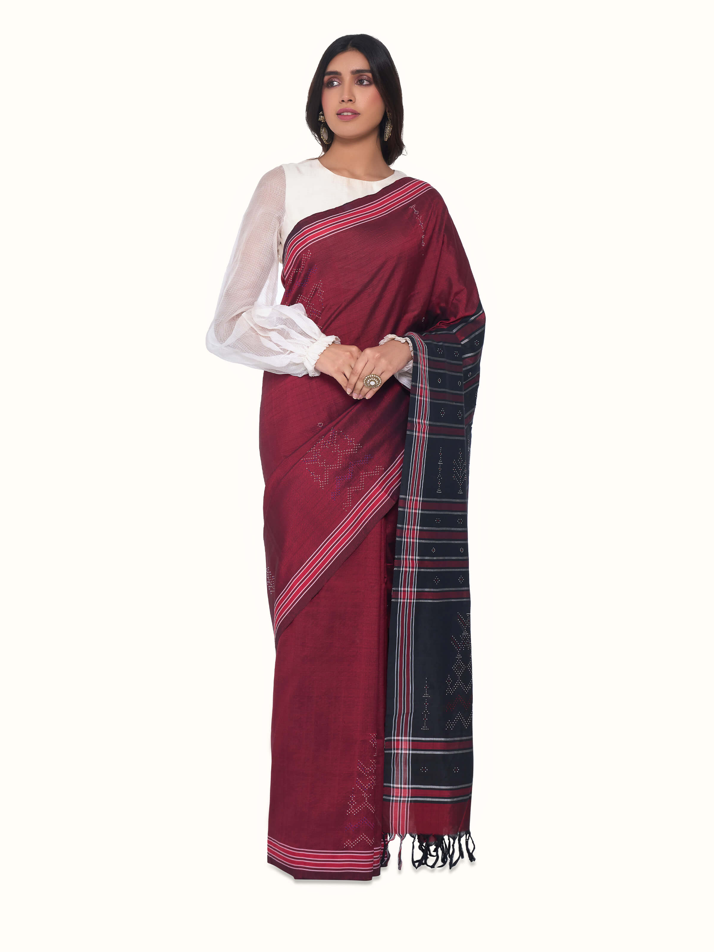 Front view of maroon cotton silk tangalia saree with traditional dotted weave patterns