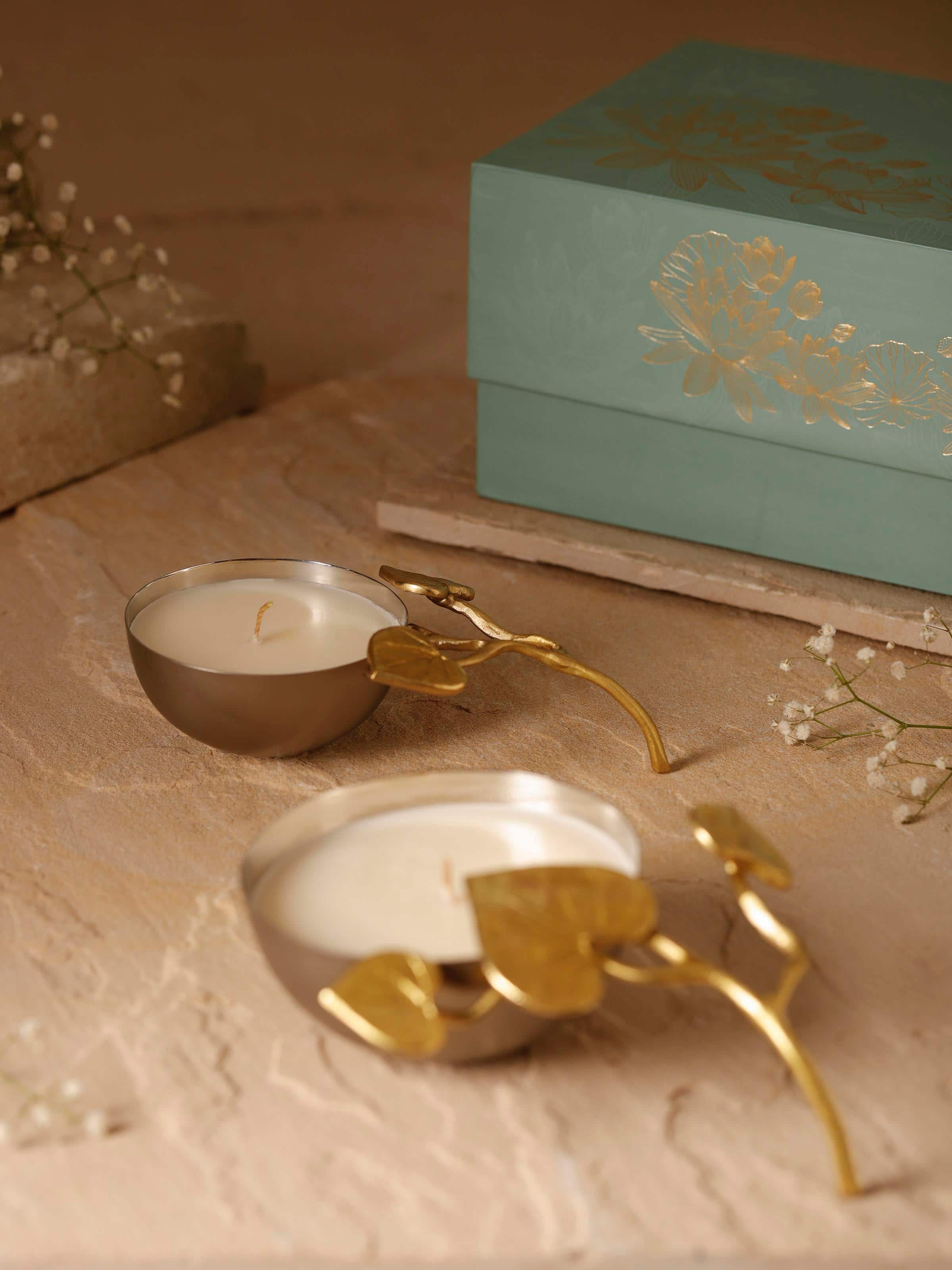 Side view of Neroli brass candles (set of 2) showcasing their refined craftsmanship and decorative details.