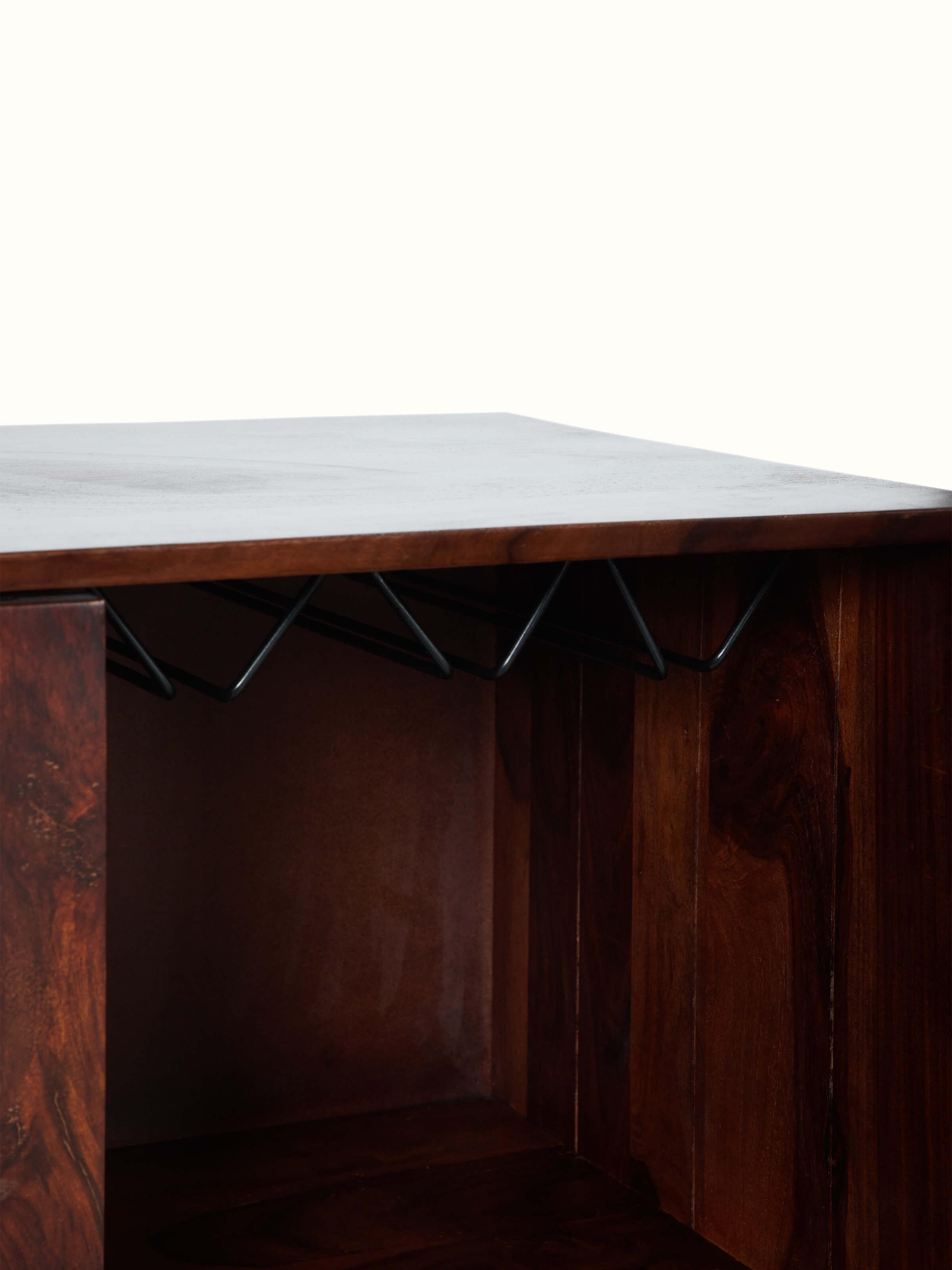 Full view of the Sheesham wood and cane bar cabinet from a different angle, showing its versatility and style.