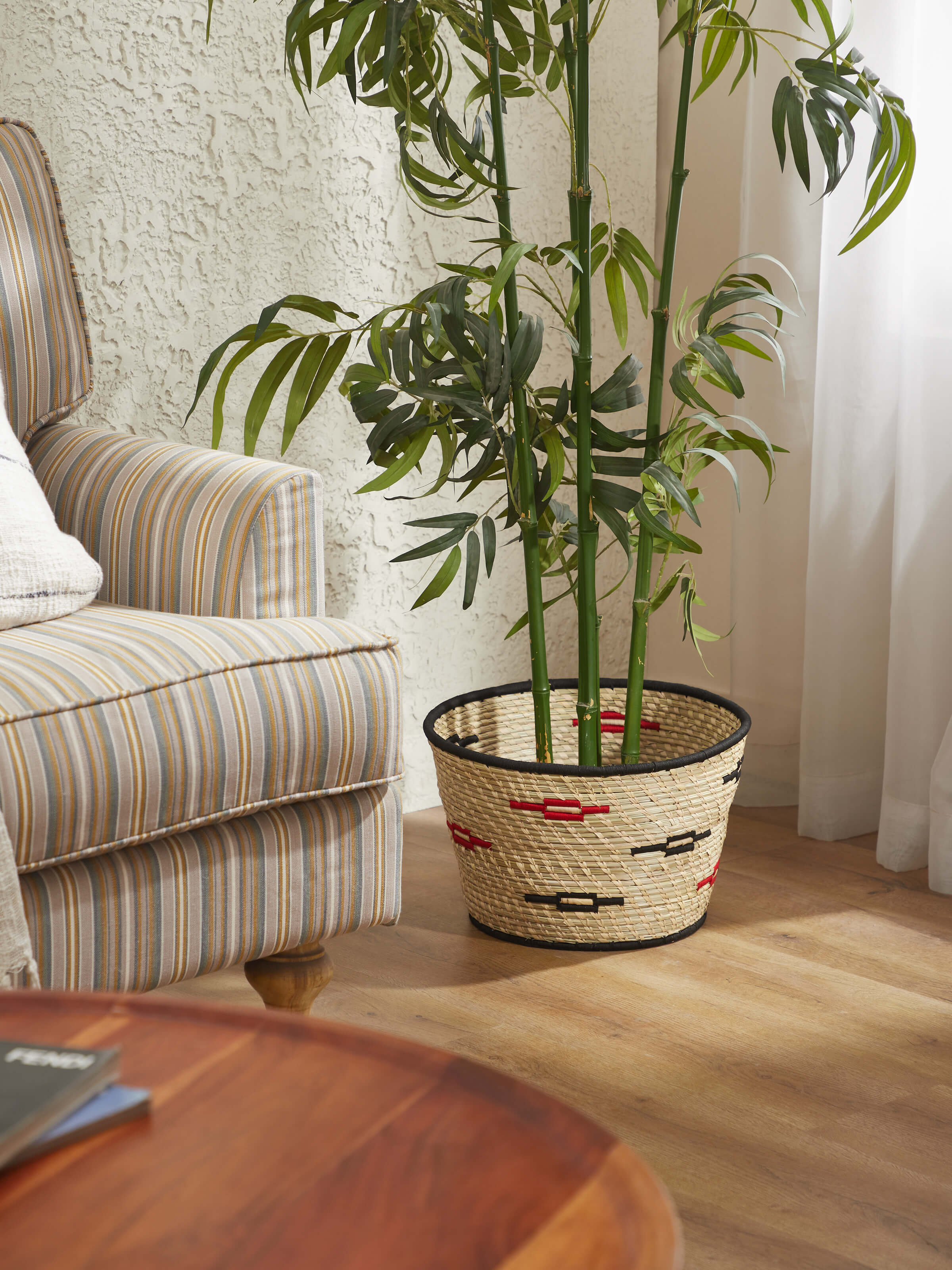Side view of Round Natural Kanshi Fibre Planter displaying its elegant design