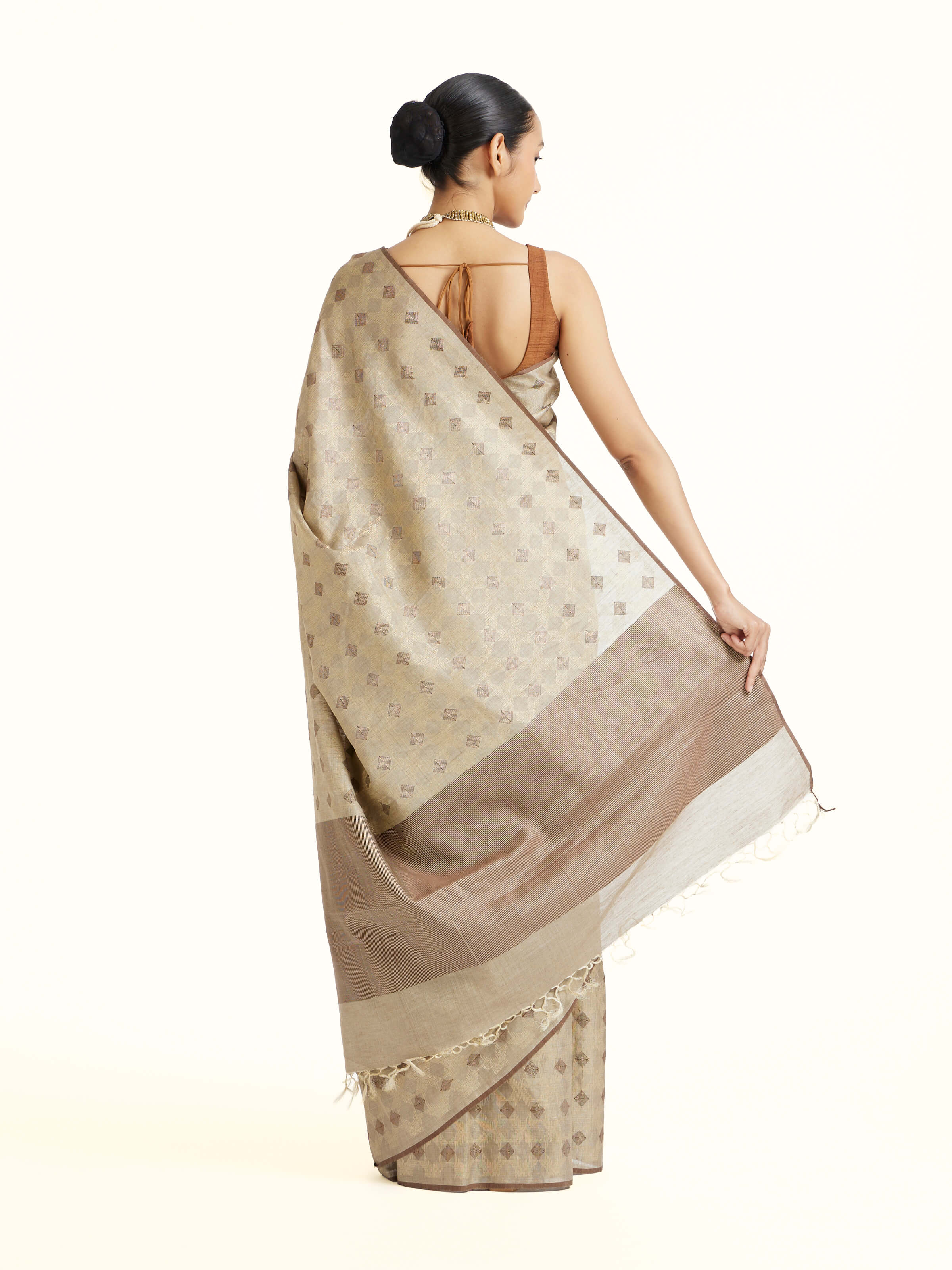 Back view of the Beige Tussar Silk Saree