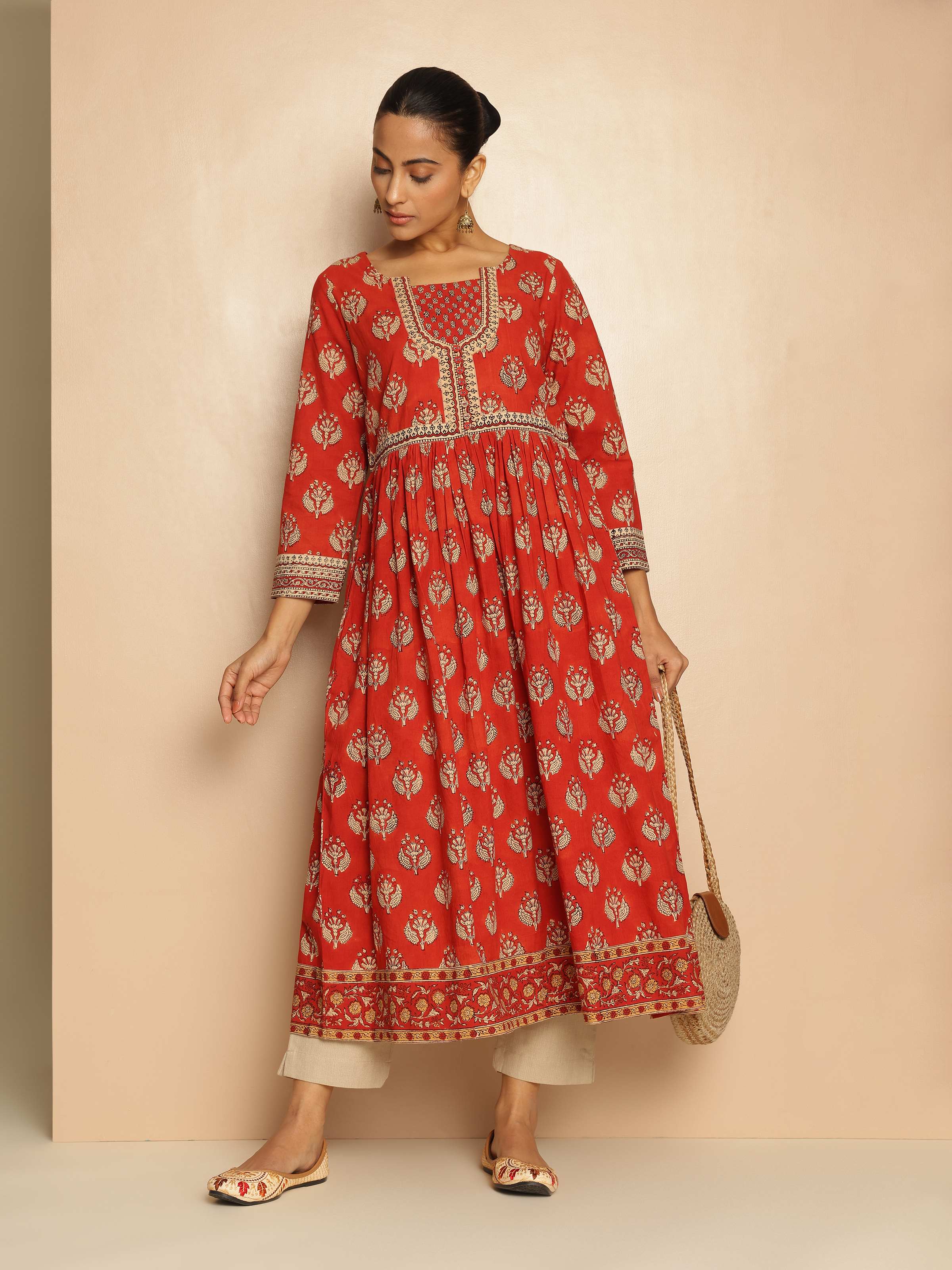 Alternate lifestyle view of red cotton Bagru kurta showing elegant fit