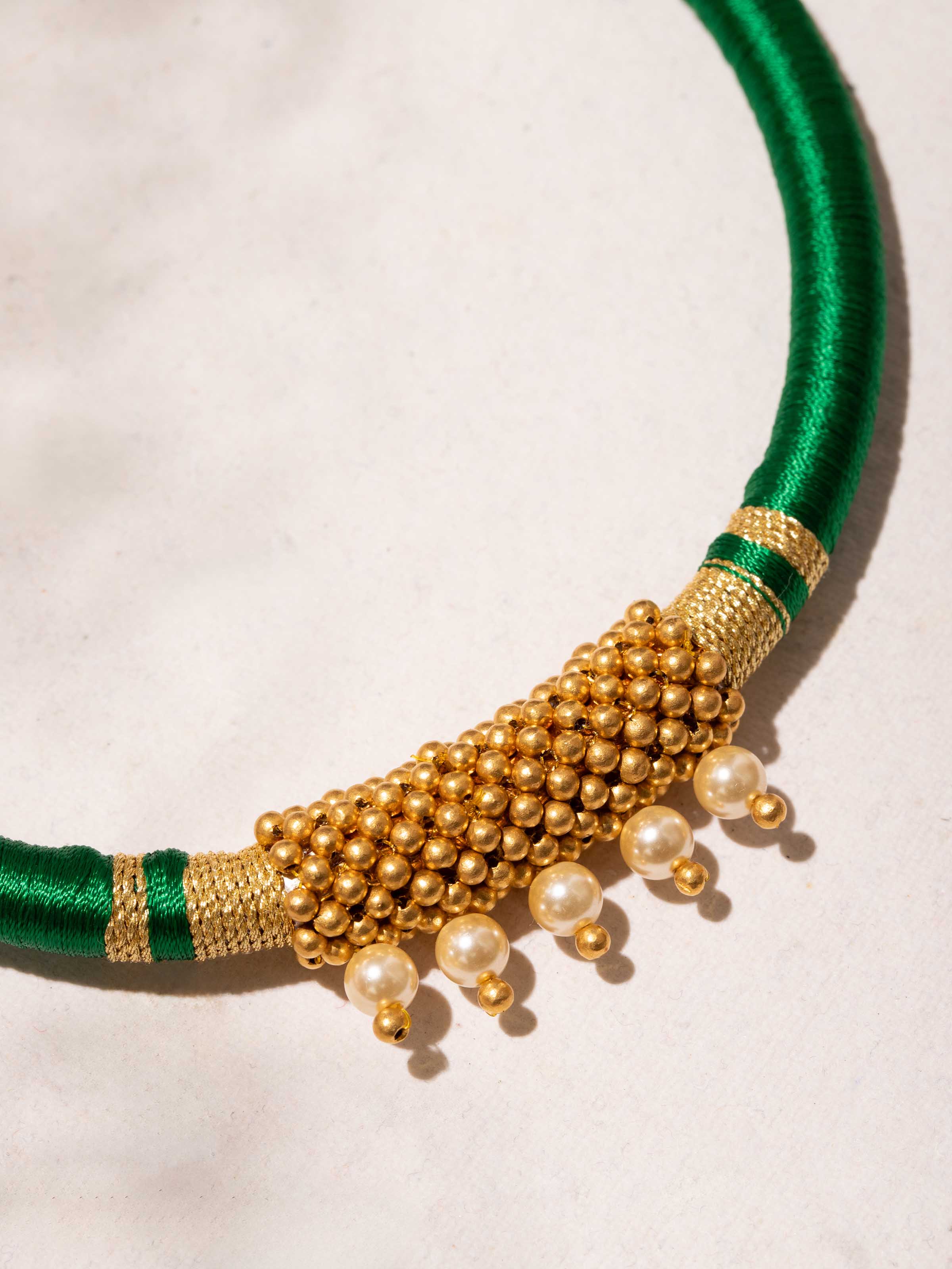 Close-up of craftsmanship on Thushi 22 karat collar necklace