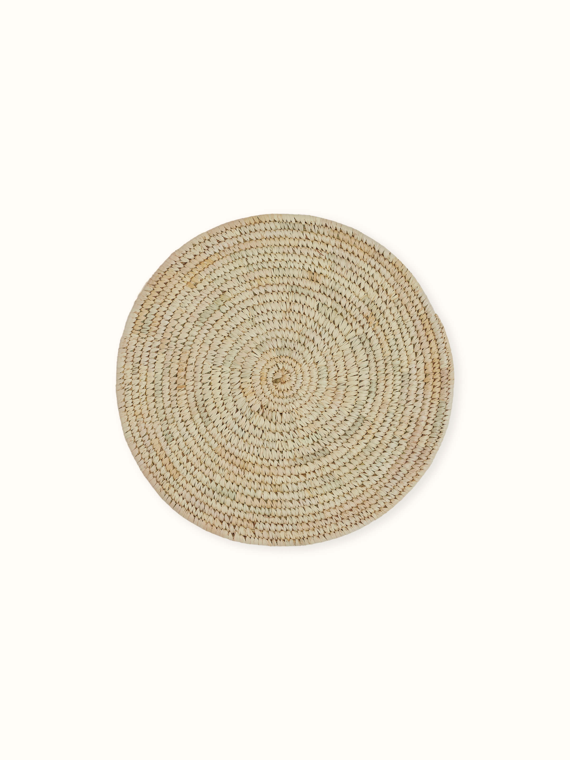 Angled side shot emphasizing the natural earthy texture and solid light green tone of the Sabai grass mats