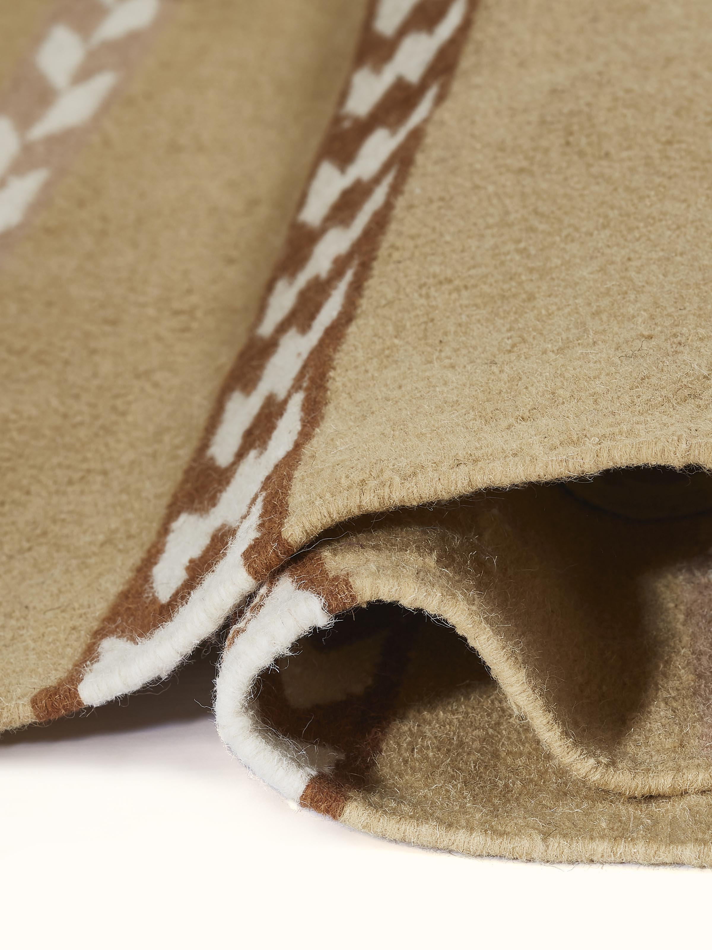 Detailed shot emphasizing the quality of knotting and fabric finish