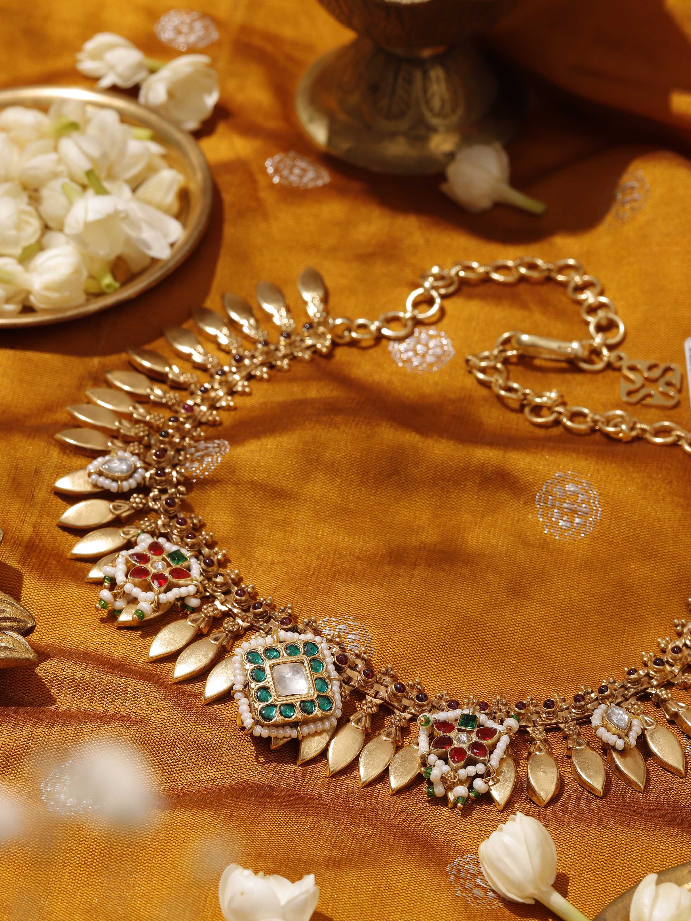 Lifestyle view of collar necklace styled with ethnic attire for statement appeal