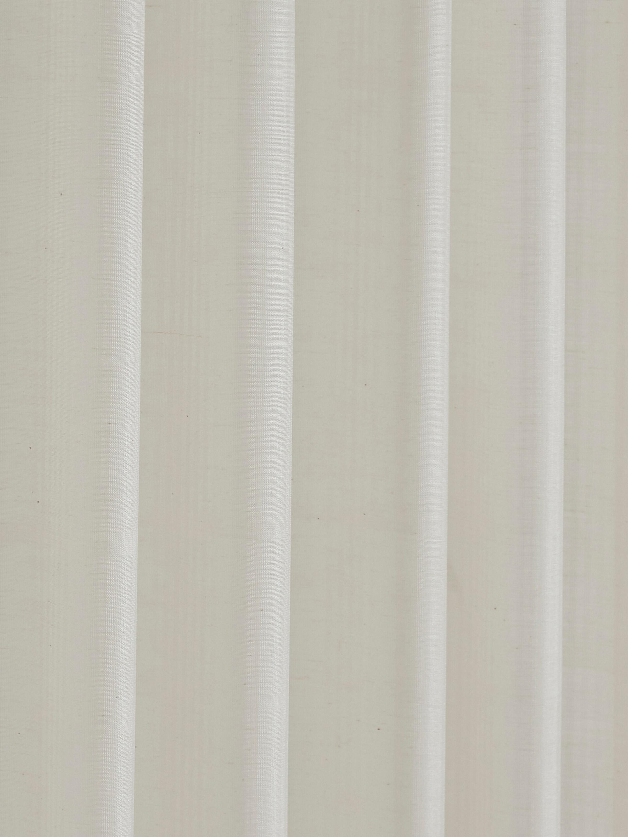 Close-up showing texture and fluid drape of Maheshwari silk cotton sheer.