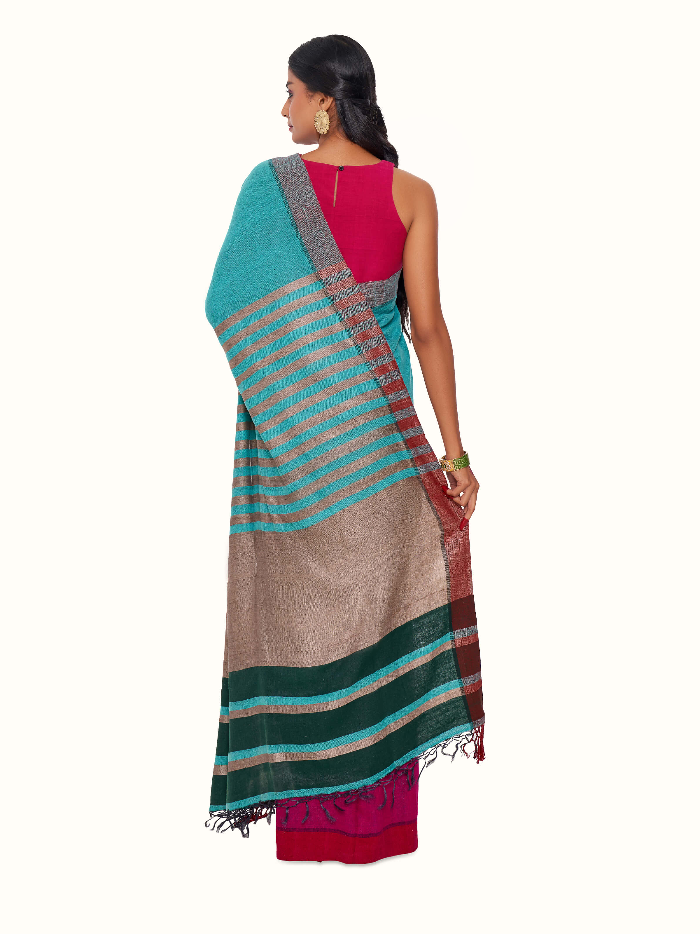 Back view of turquoise tussar silk Bhagalpur saree displaying pallu design