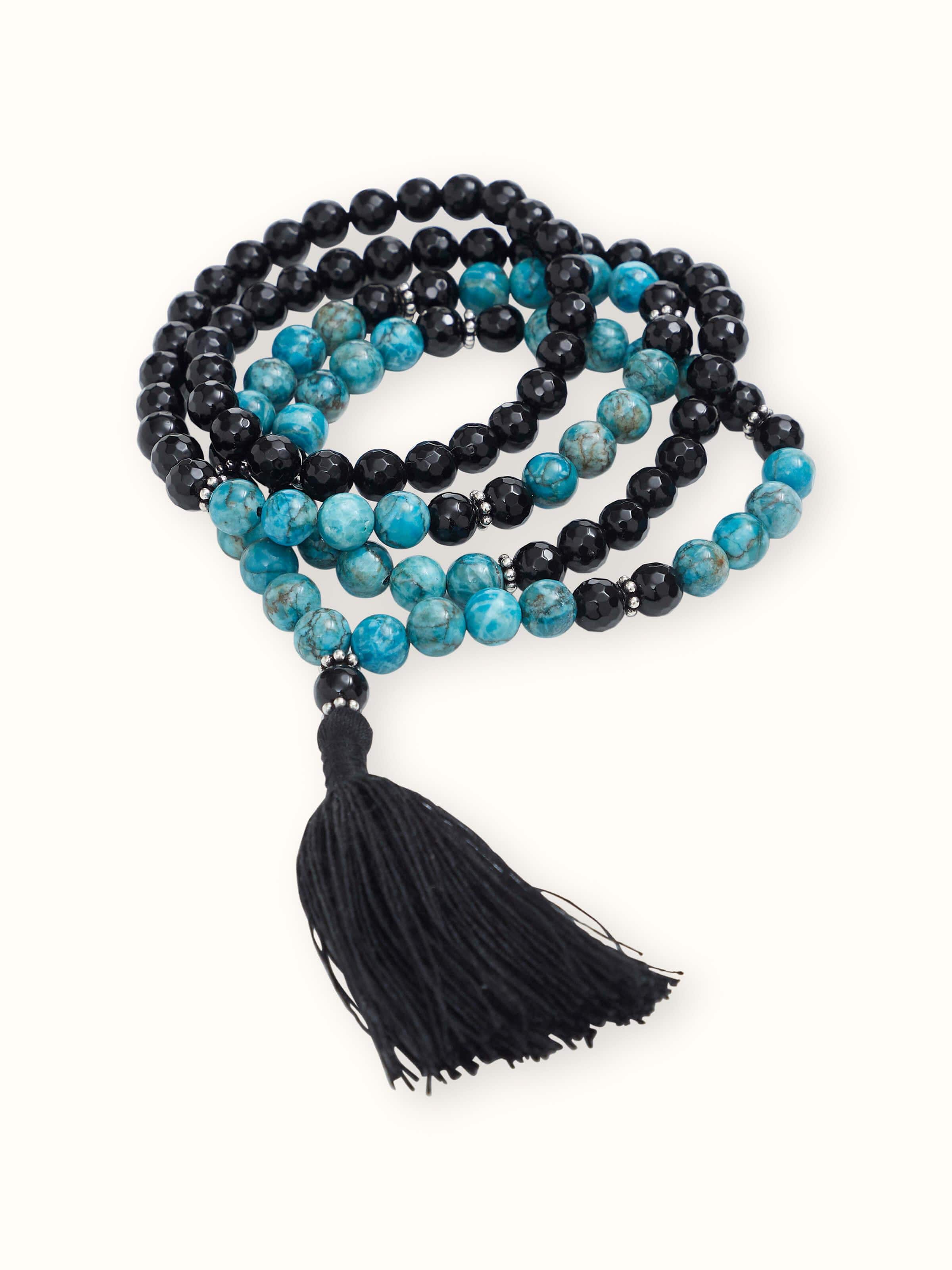 Front view of Black Onyx & Turquoise Silver Mala featuring vibrant turquoise accents with polished black onyx beads