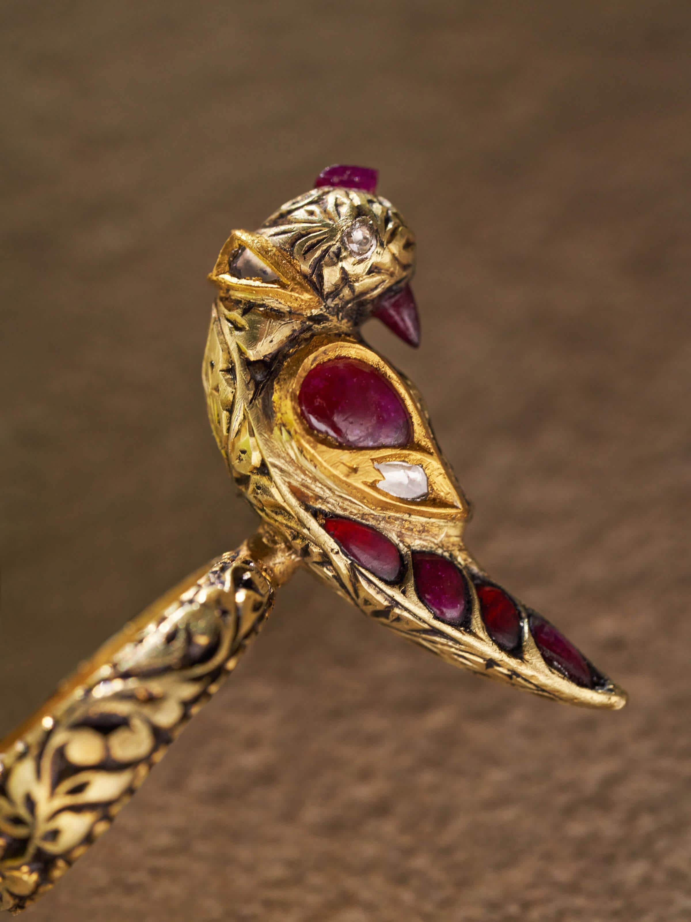 Angled view of Partash 18 Karat gold ring showing its detailed craftsmanship.