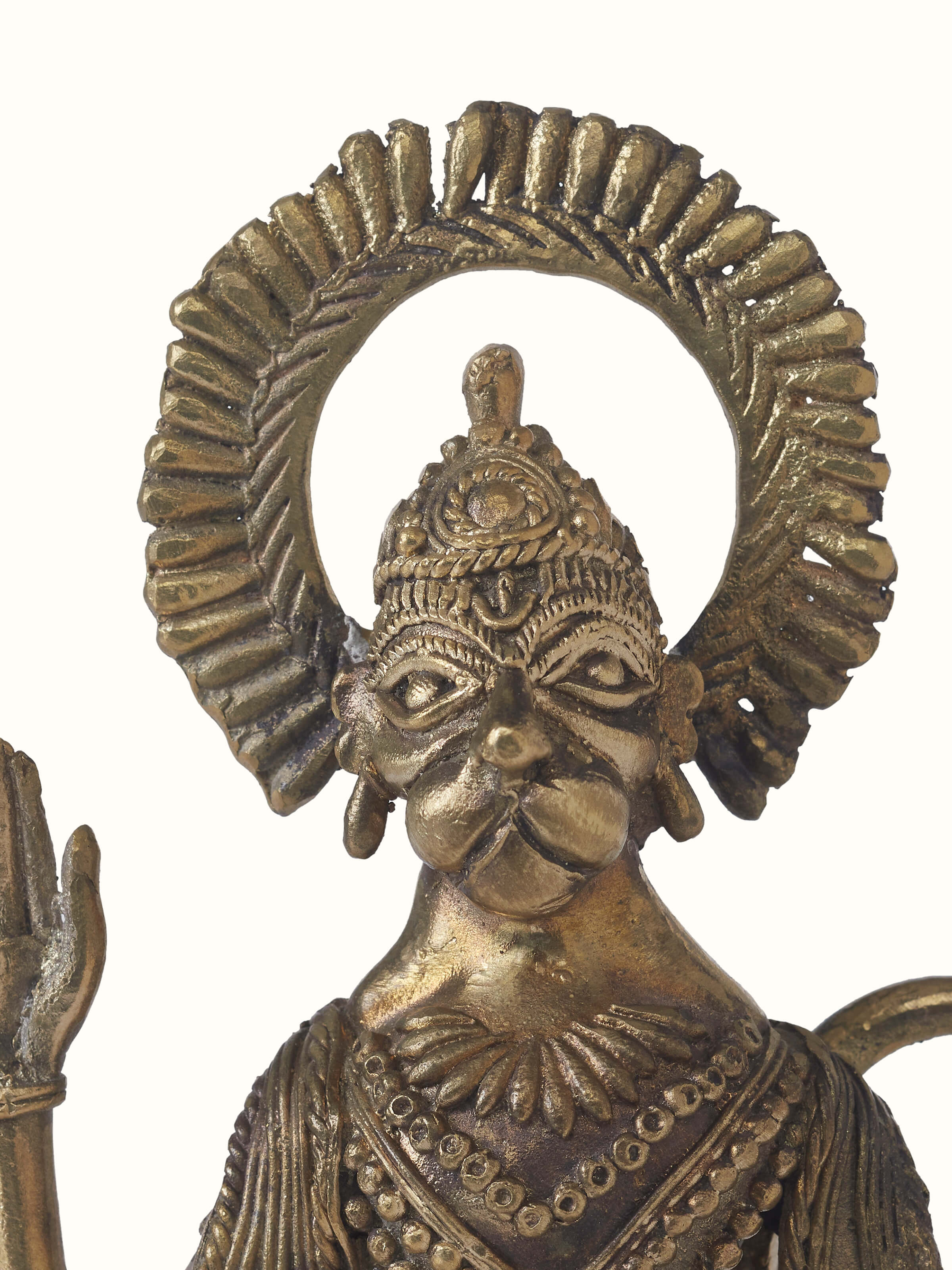 Detailed close-up of Dokra brass Hanuman Ji idol showing intricate metalwork