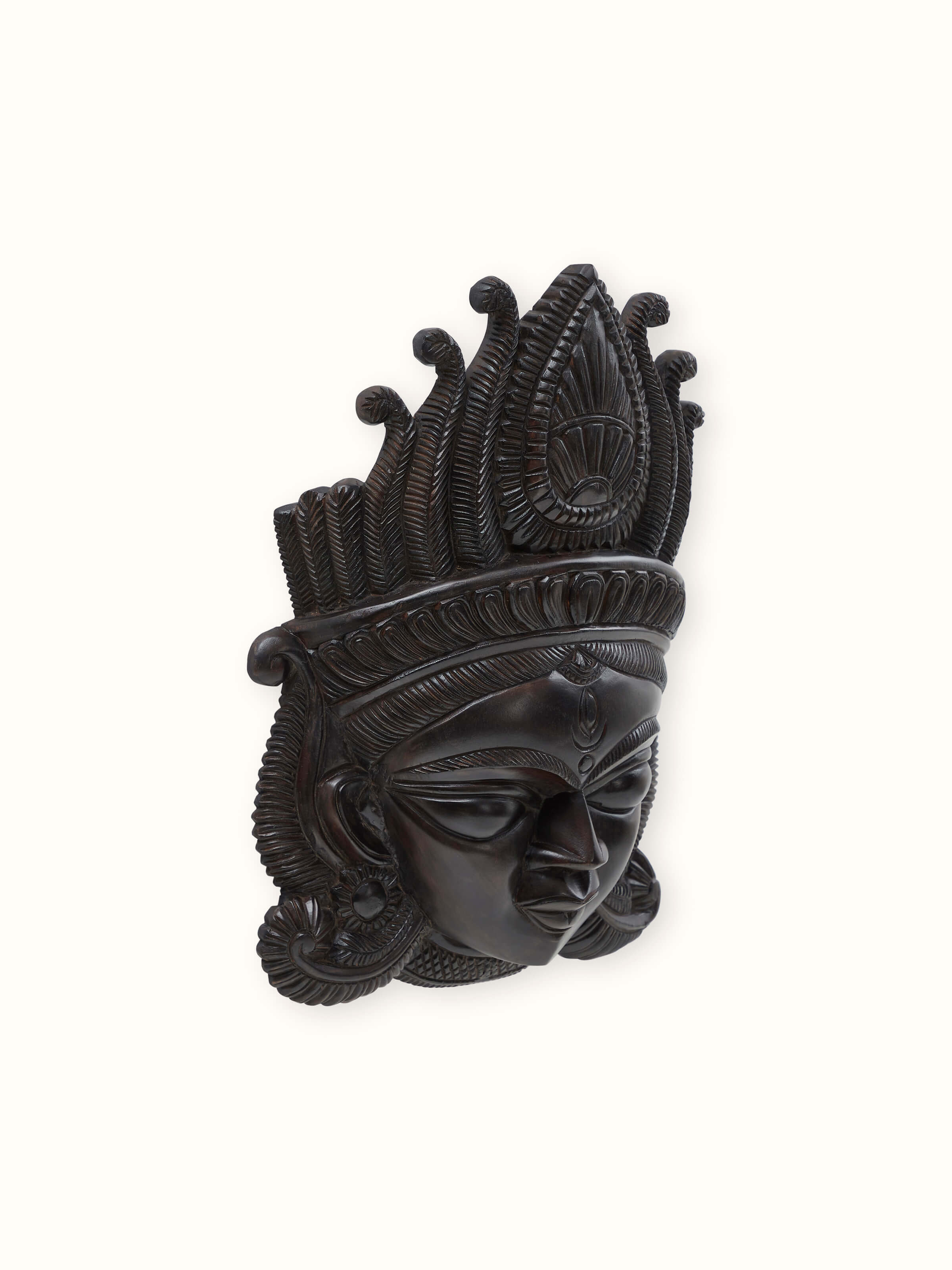 Angled view of Kushmandi Devi Wall Mask