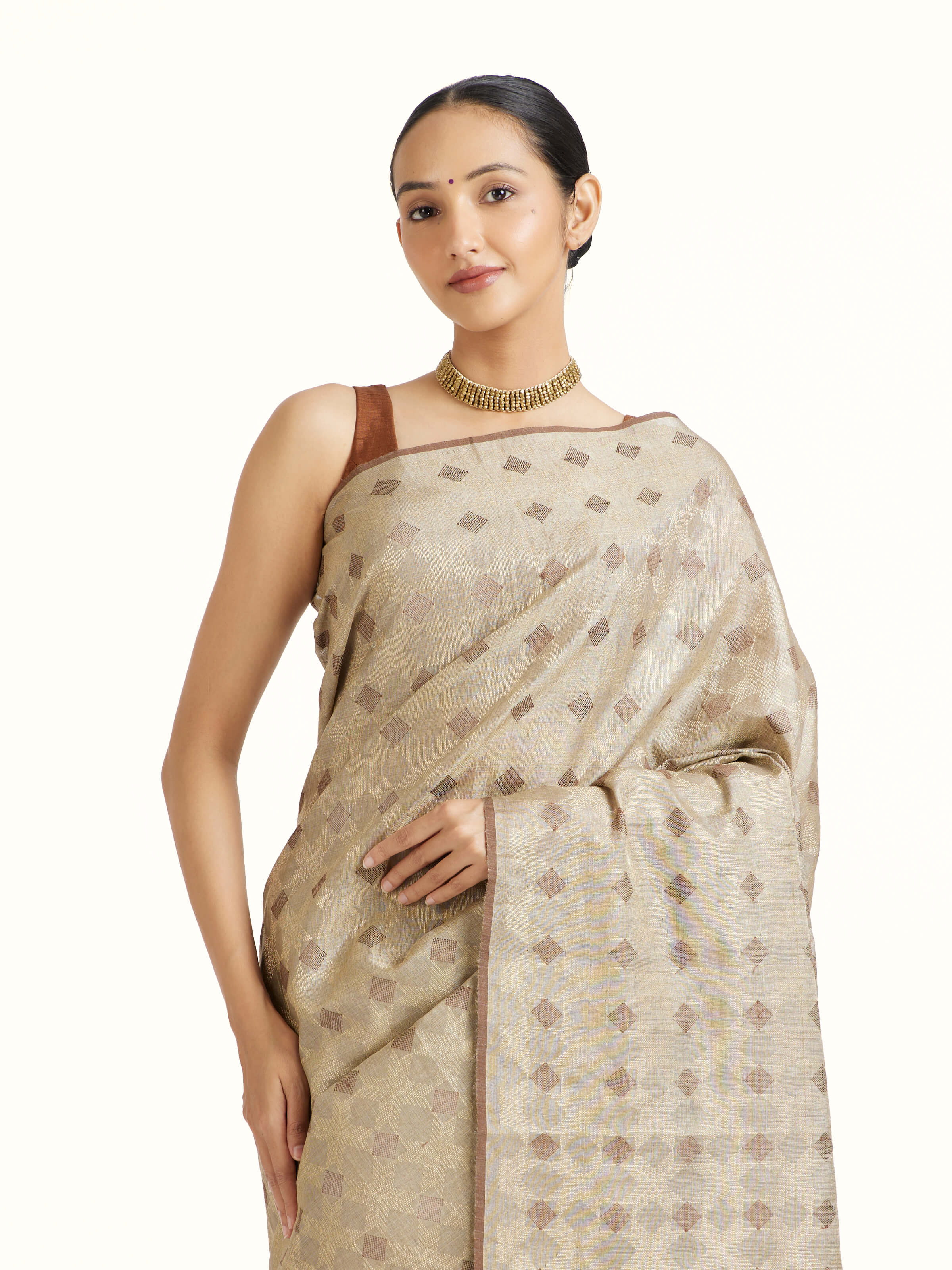 Angled view of the Beige Tussar Silk Saree