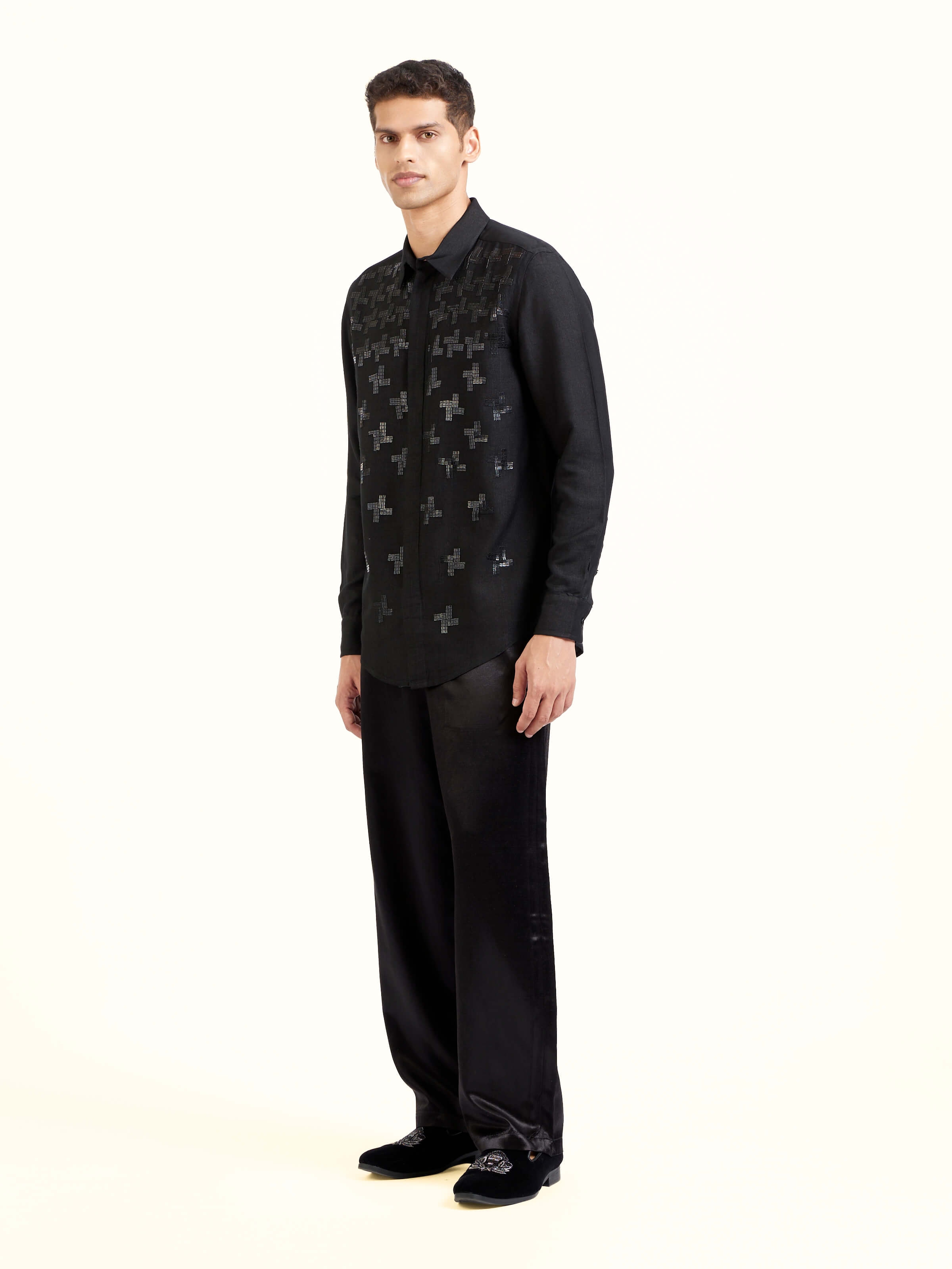 Side view of black hand embroidery shirt showcasing tailored fit