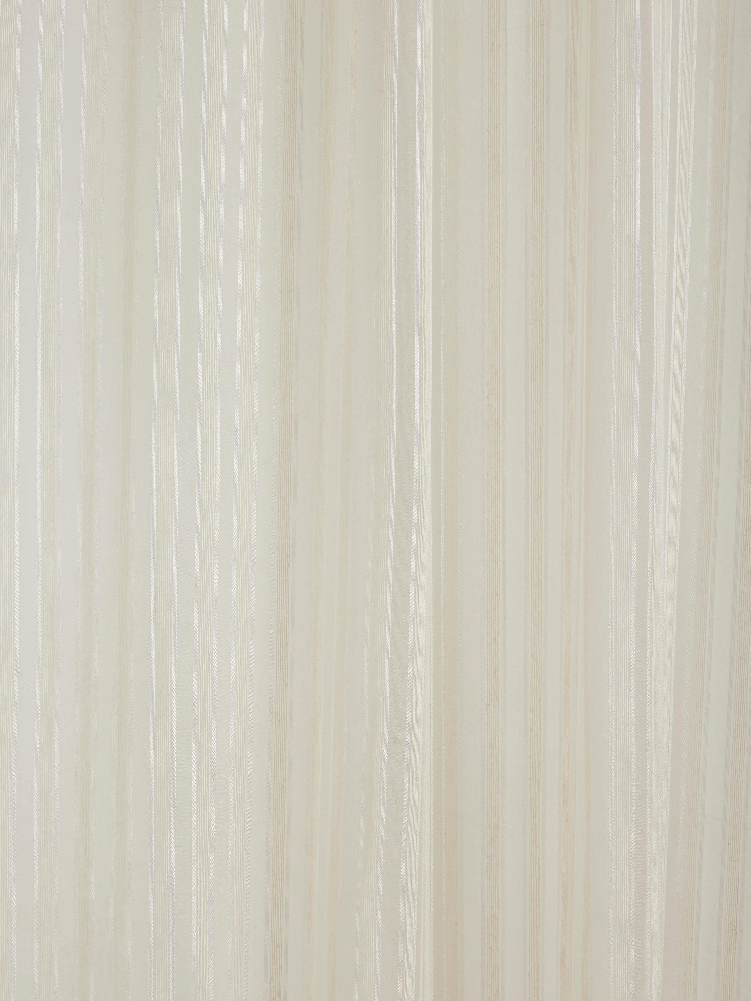Detail shot focusing on the shimmer of metallic stripe against beige Bhagalpur silk.