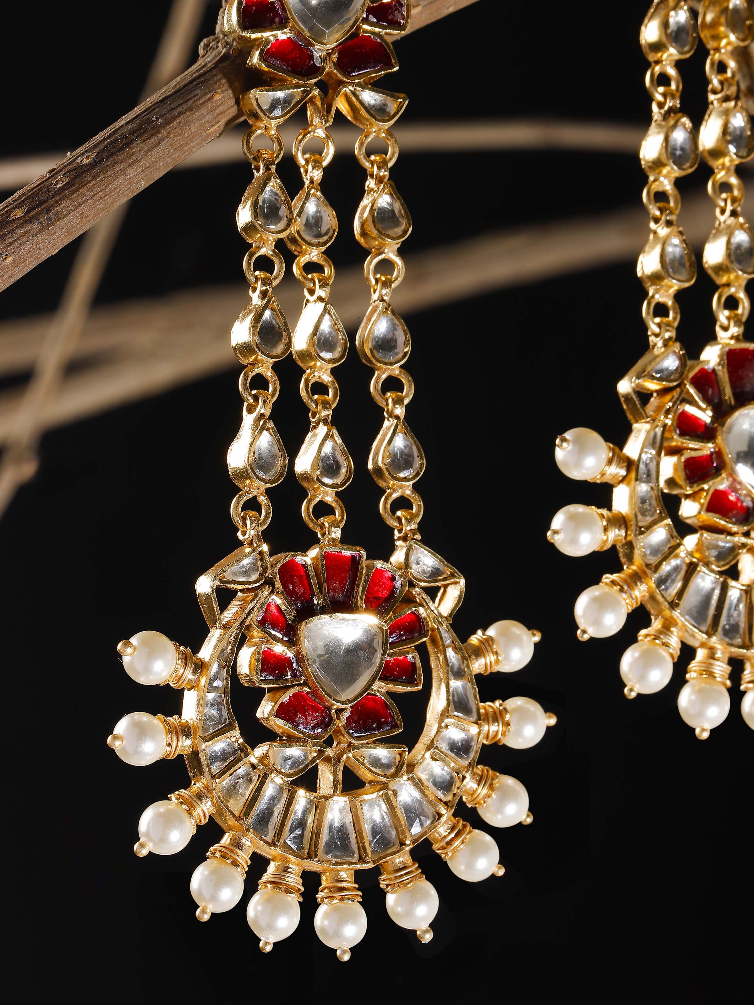 Silver smithing drop earrings close-up on display – Swadesh