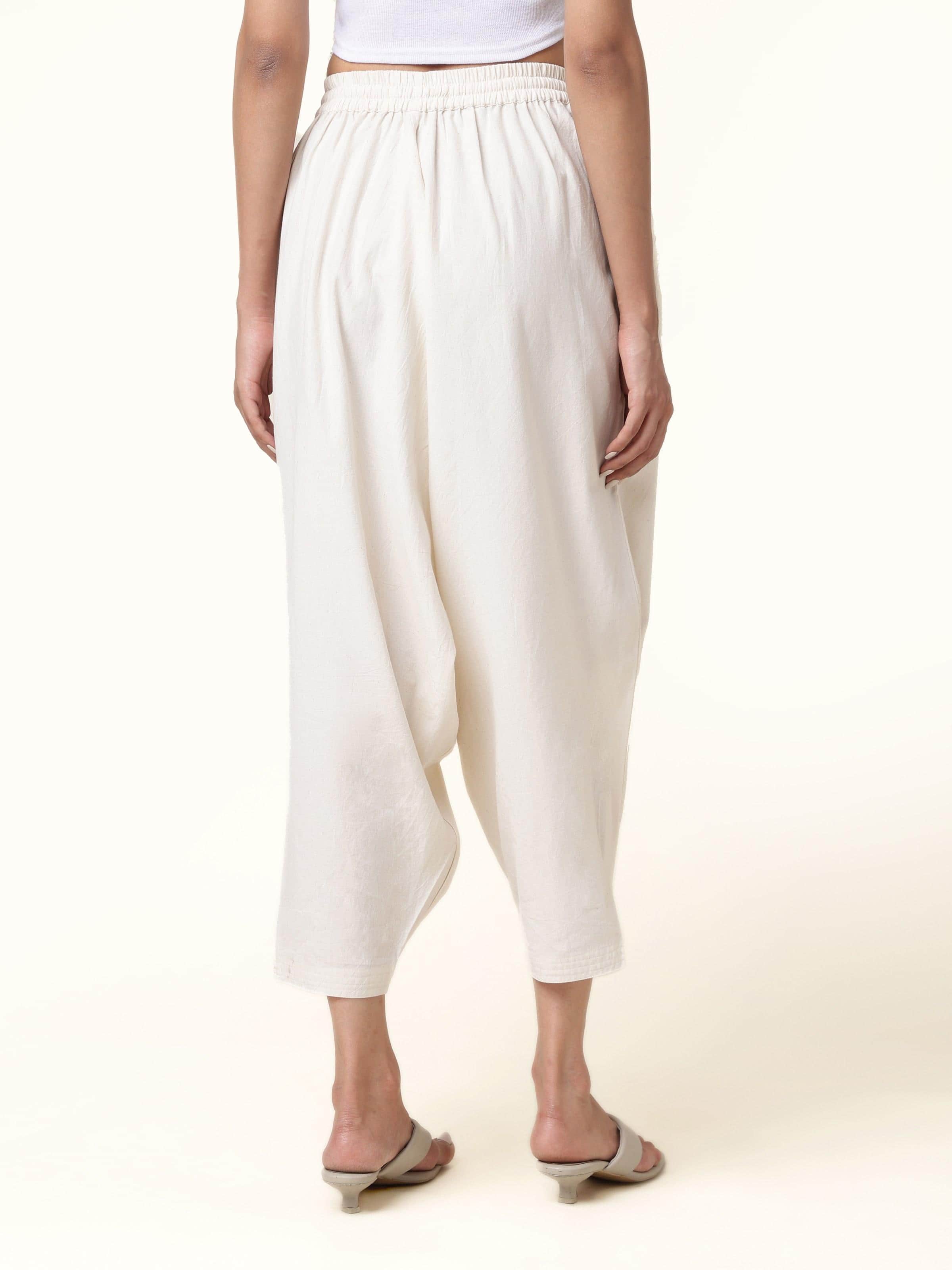 Back view of cotton harem pants highlighting wide fit and airy cotton fabric