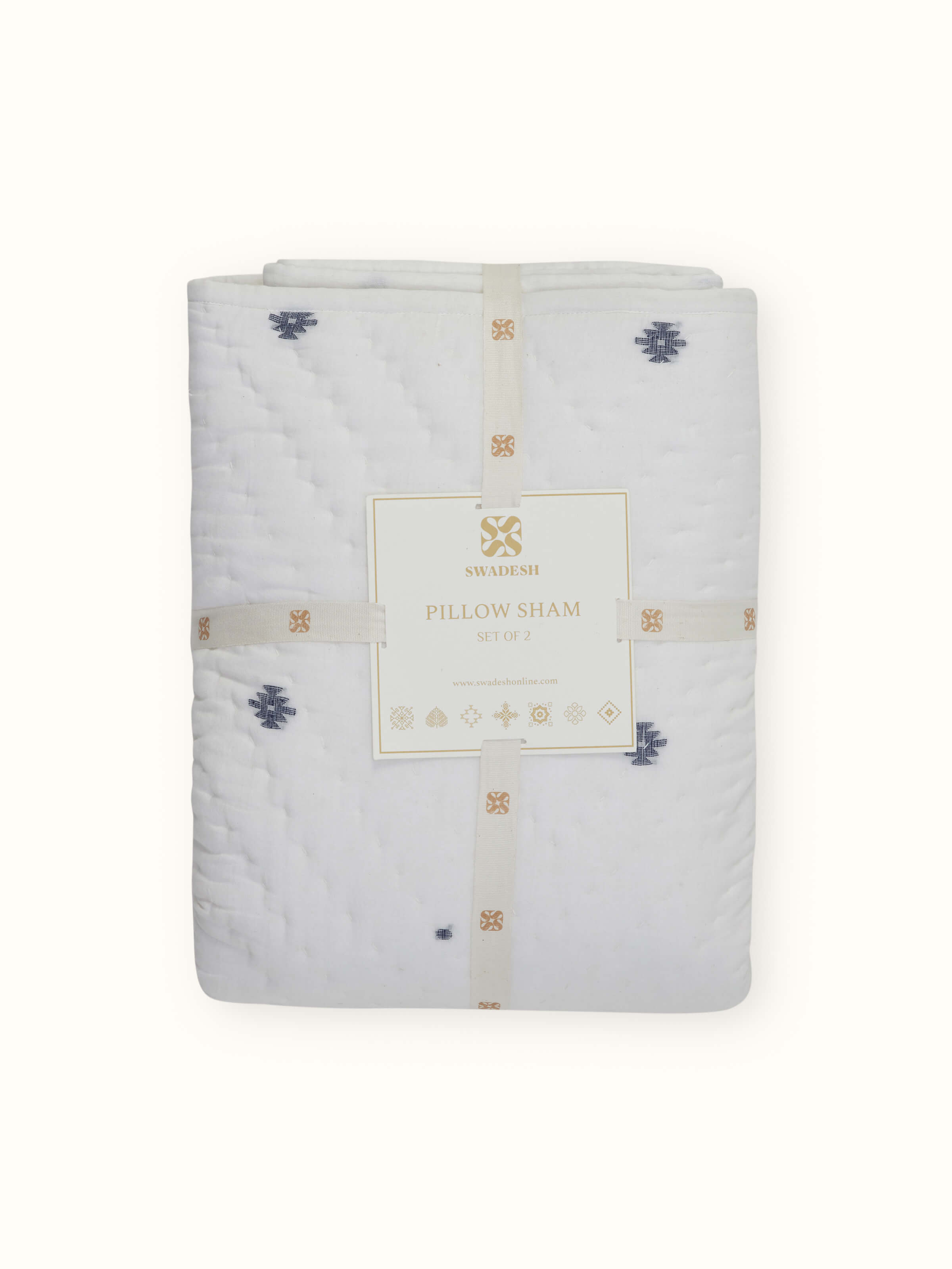 Side angle close-up of Kalpanama Ivory Pillow Shams showcasing fine cotton texture and handwoven details