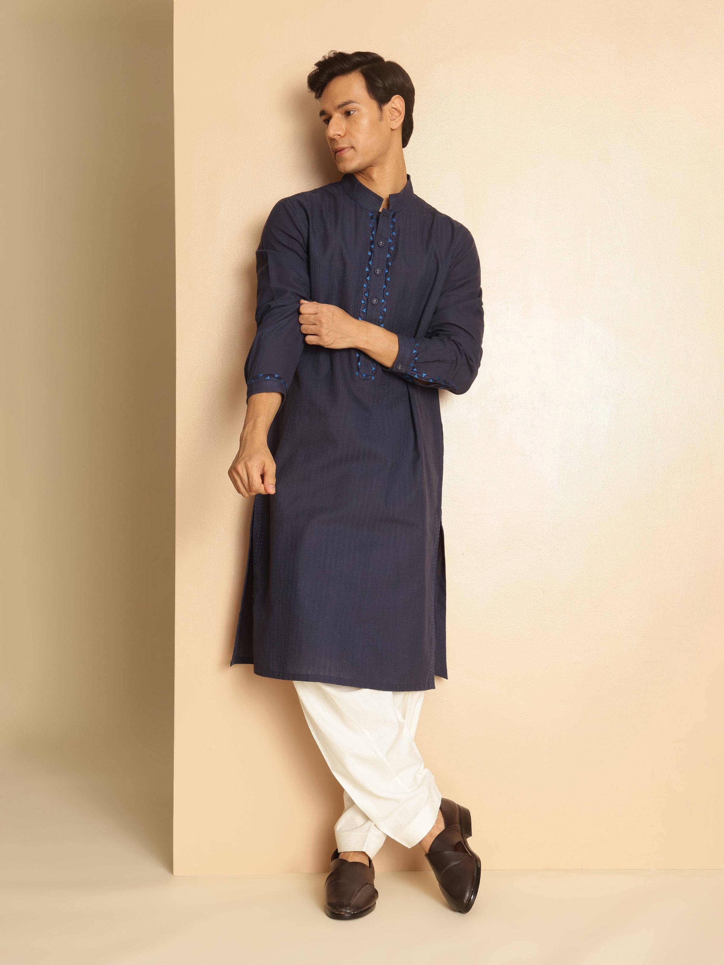 Lifestyle view of off-white cotton salwaar paired with long kurta for everyday elegance