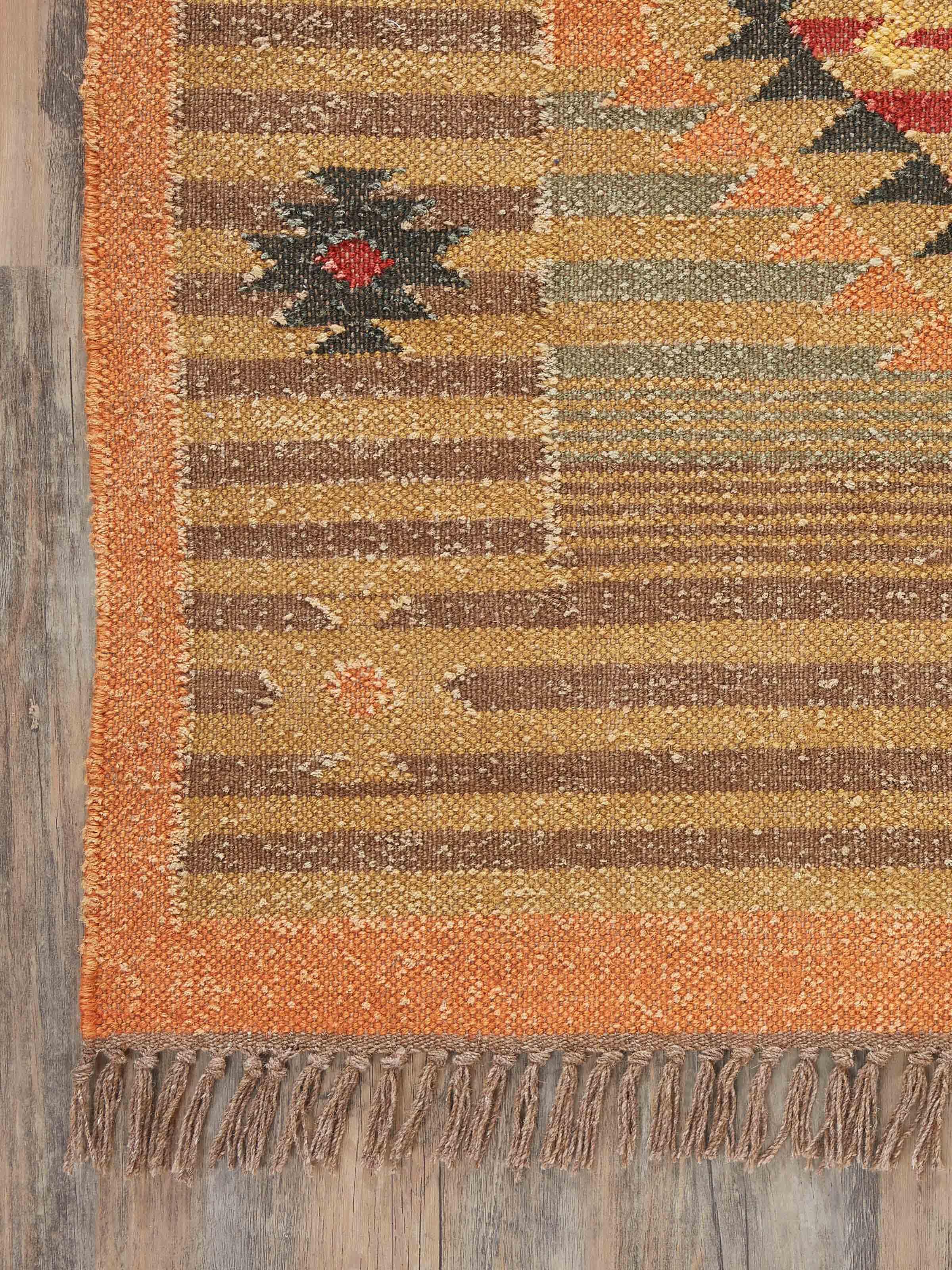 Side view of Traditional Kilim rust Lawan jute and wool Panja dhurrie showing its thickness and durable weave