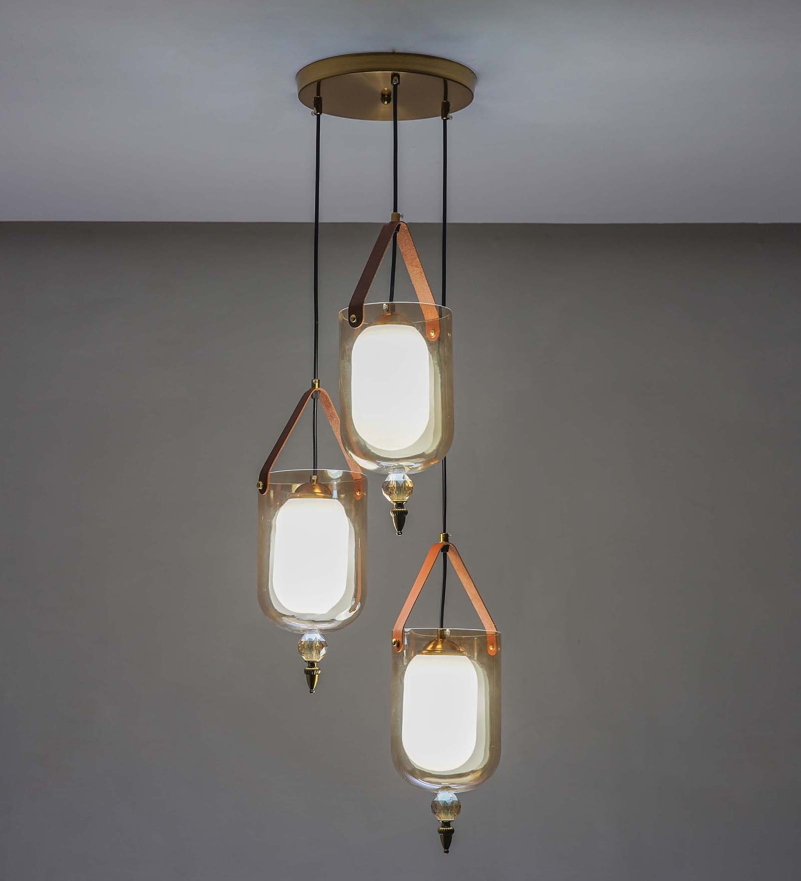Filo 3 Light Cascade Ceiling Pendant In Brass Finish Metal And Brown Leather With Frosted White Glass Shades