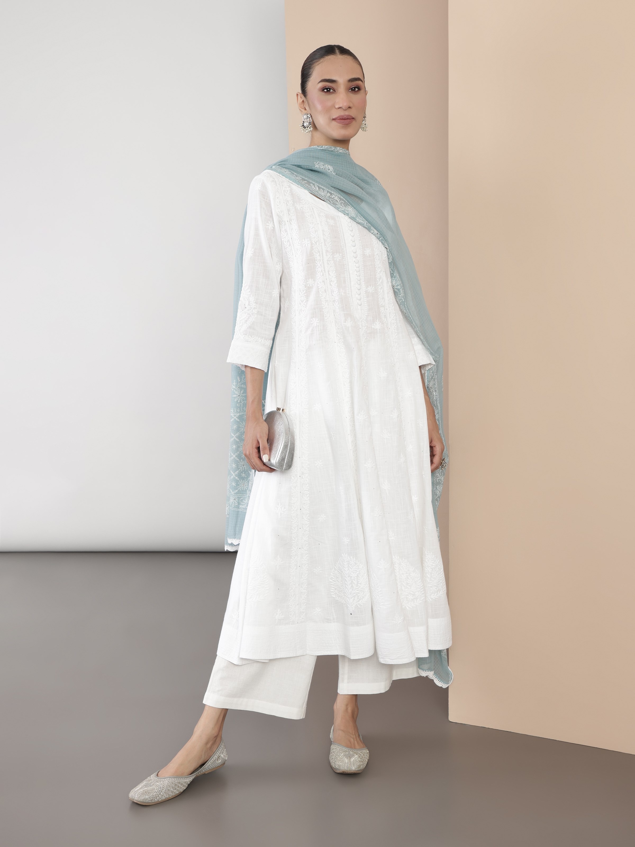 Side view showcasing the fine craftsmanship and flowing cut.