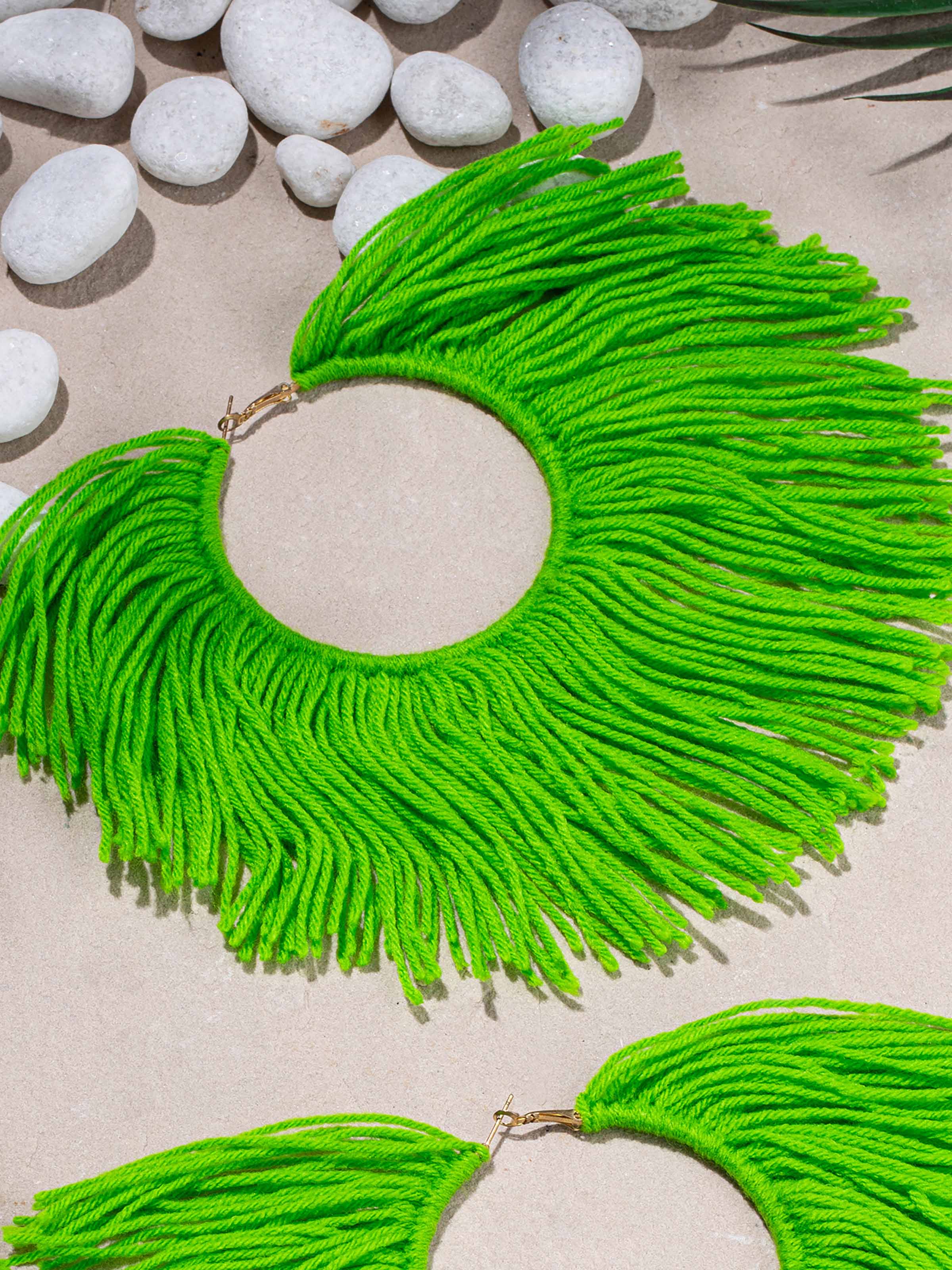 Back view of Wool Yarn Hoops featuring detailed yarn work and stylish hoop structure by Swadesh